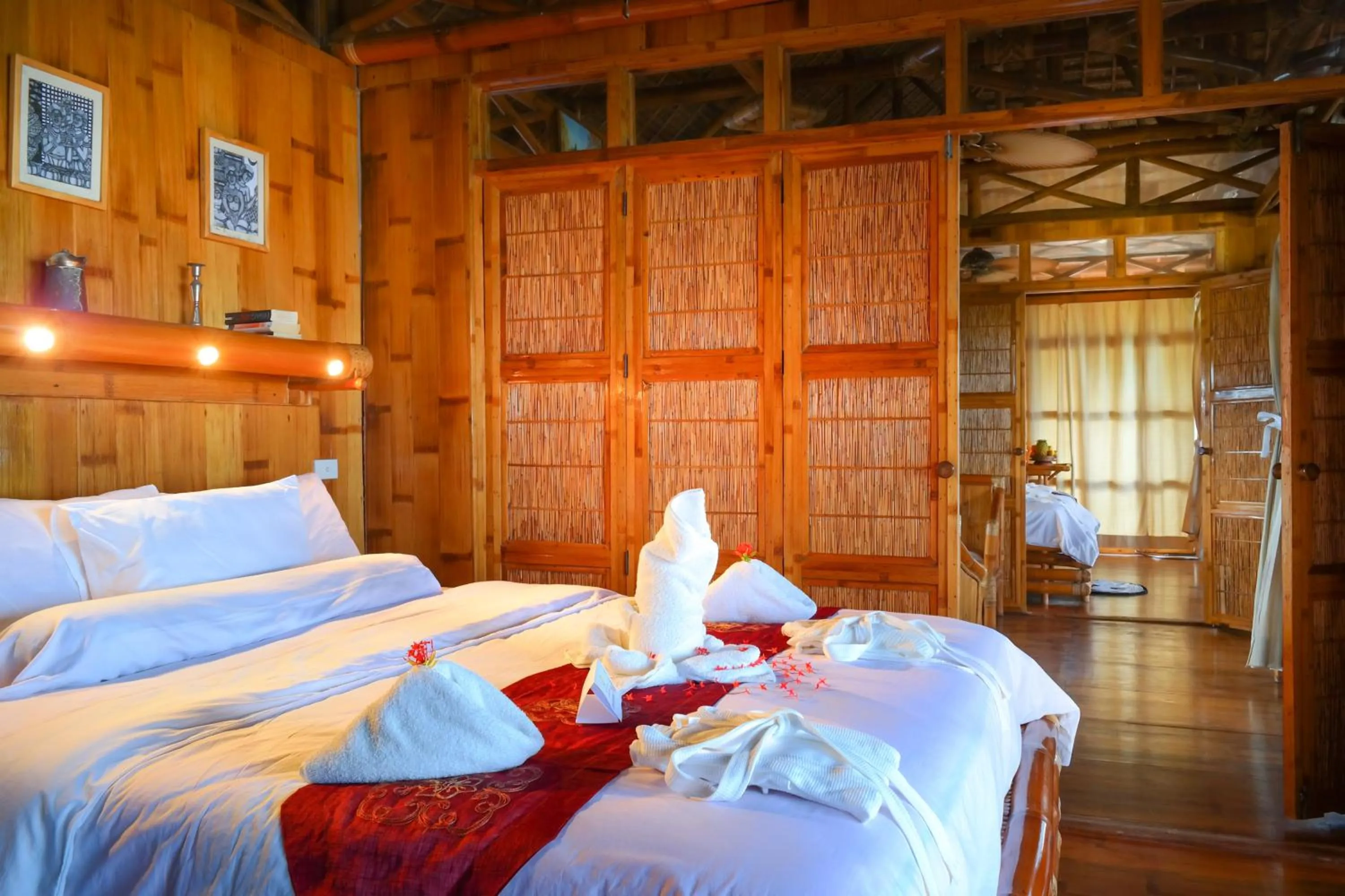 Photo of the whole room, Bed in The Coral Blue Oriental Beach Villas and Suites