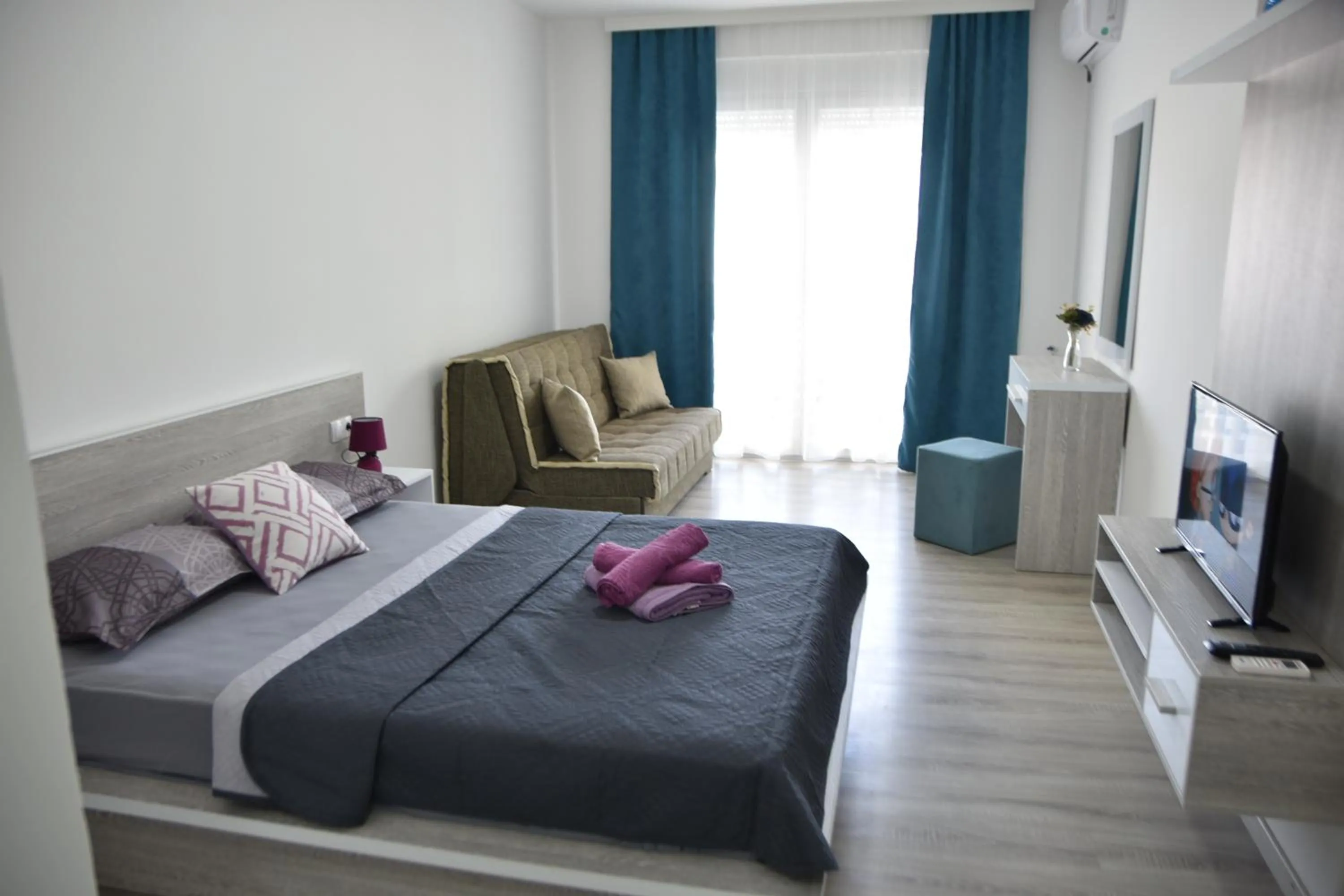 Bed in Apartments Casa Pineta