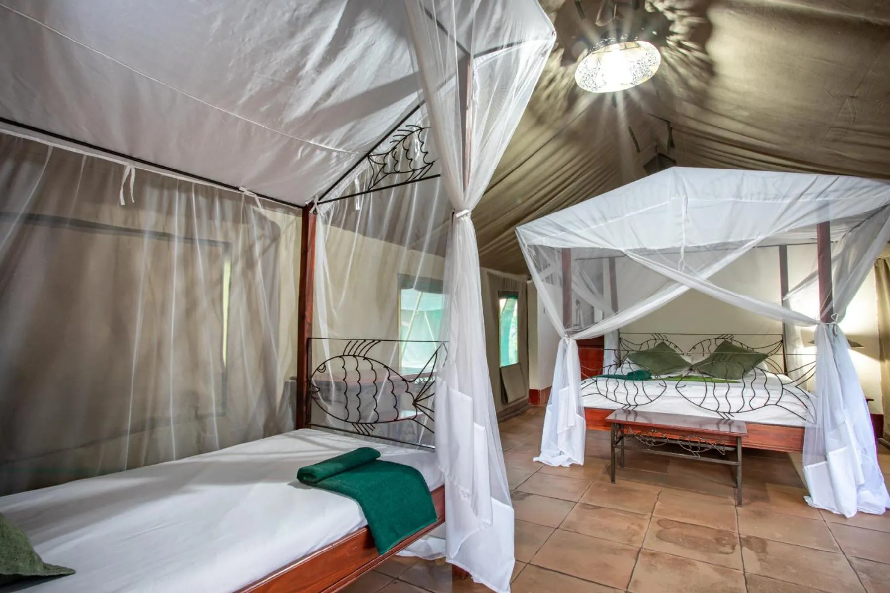 Bed in Maramba River Lodge