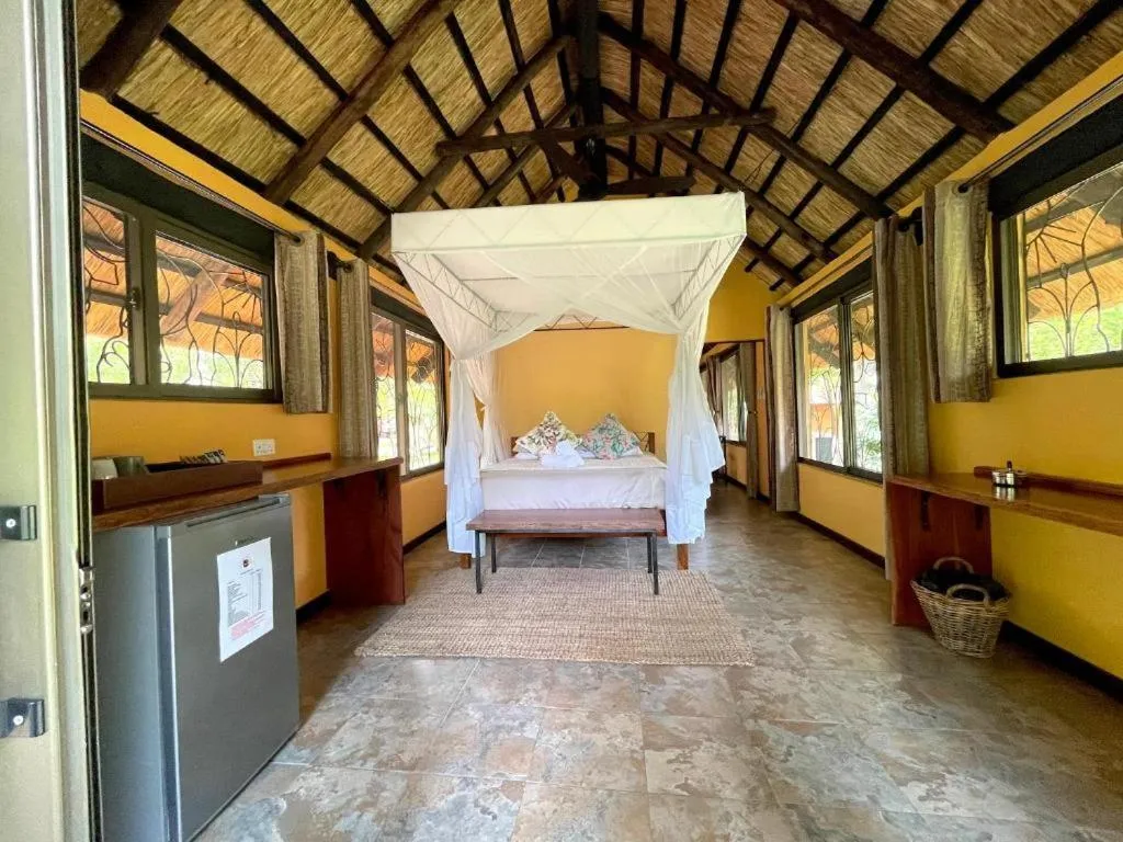 Bed in Maramba River Lodge