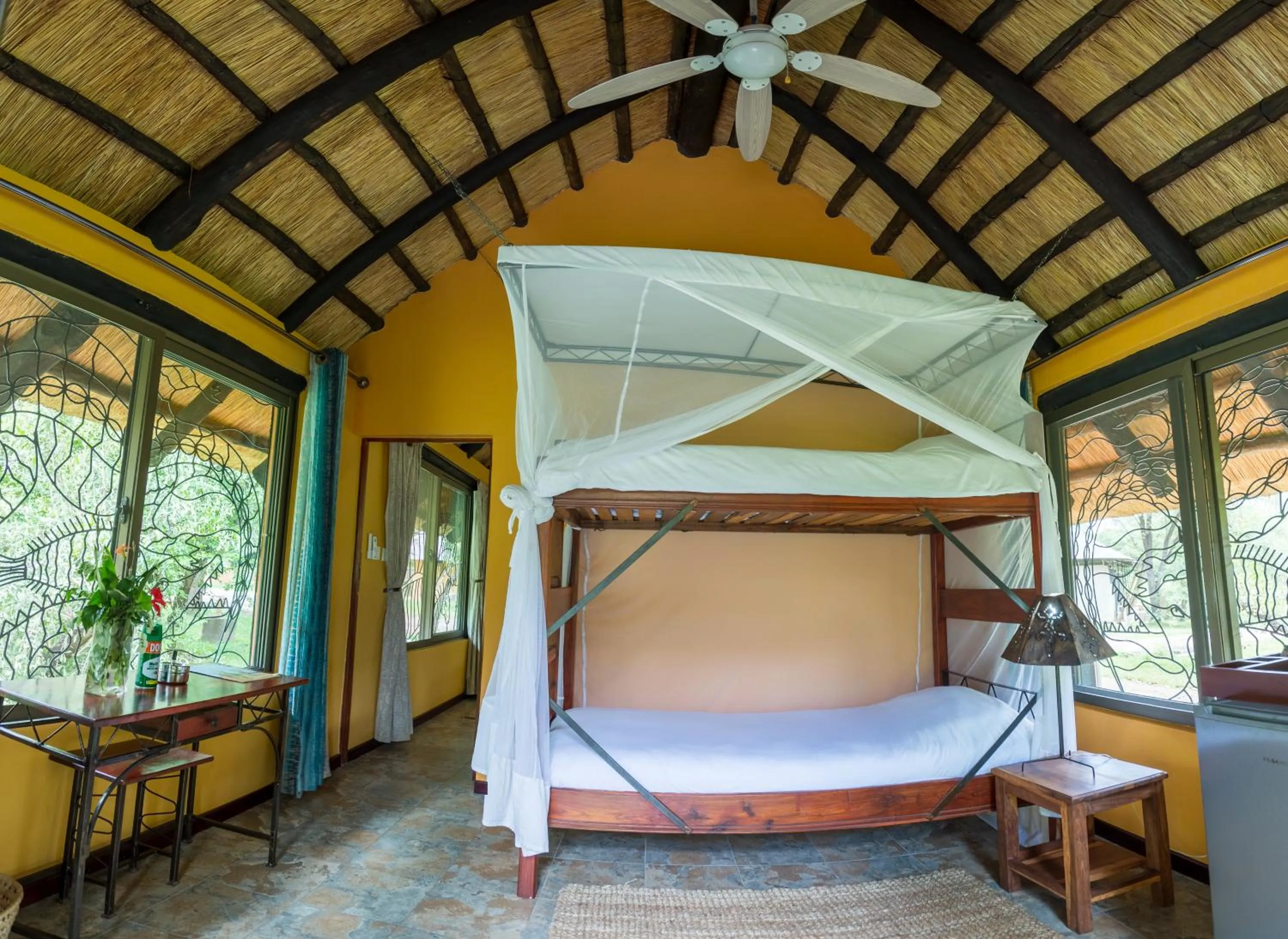 Bed in Maramba River Lodge