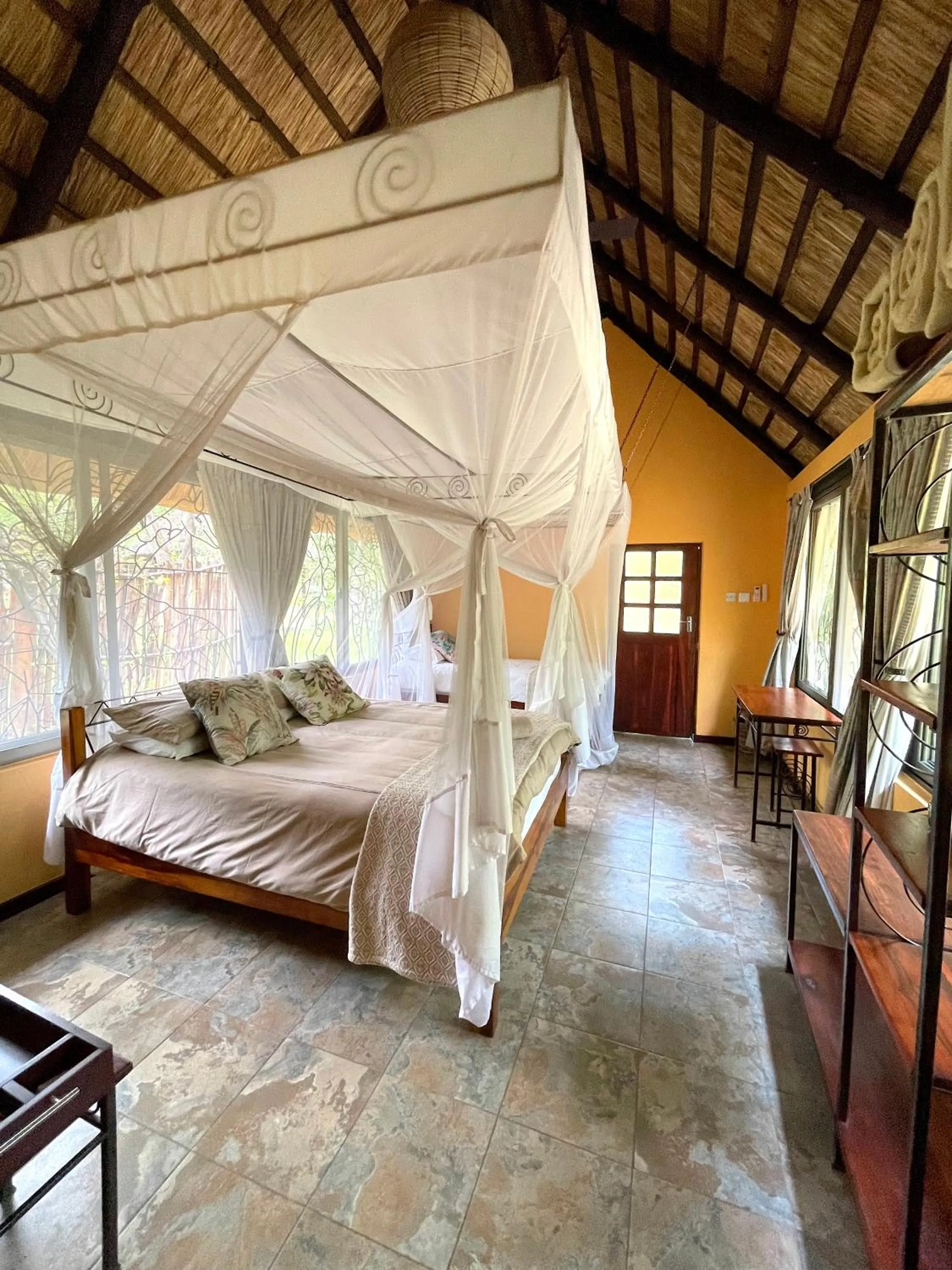 Bed in Maramba River Lodge