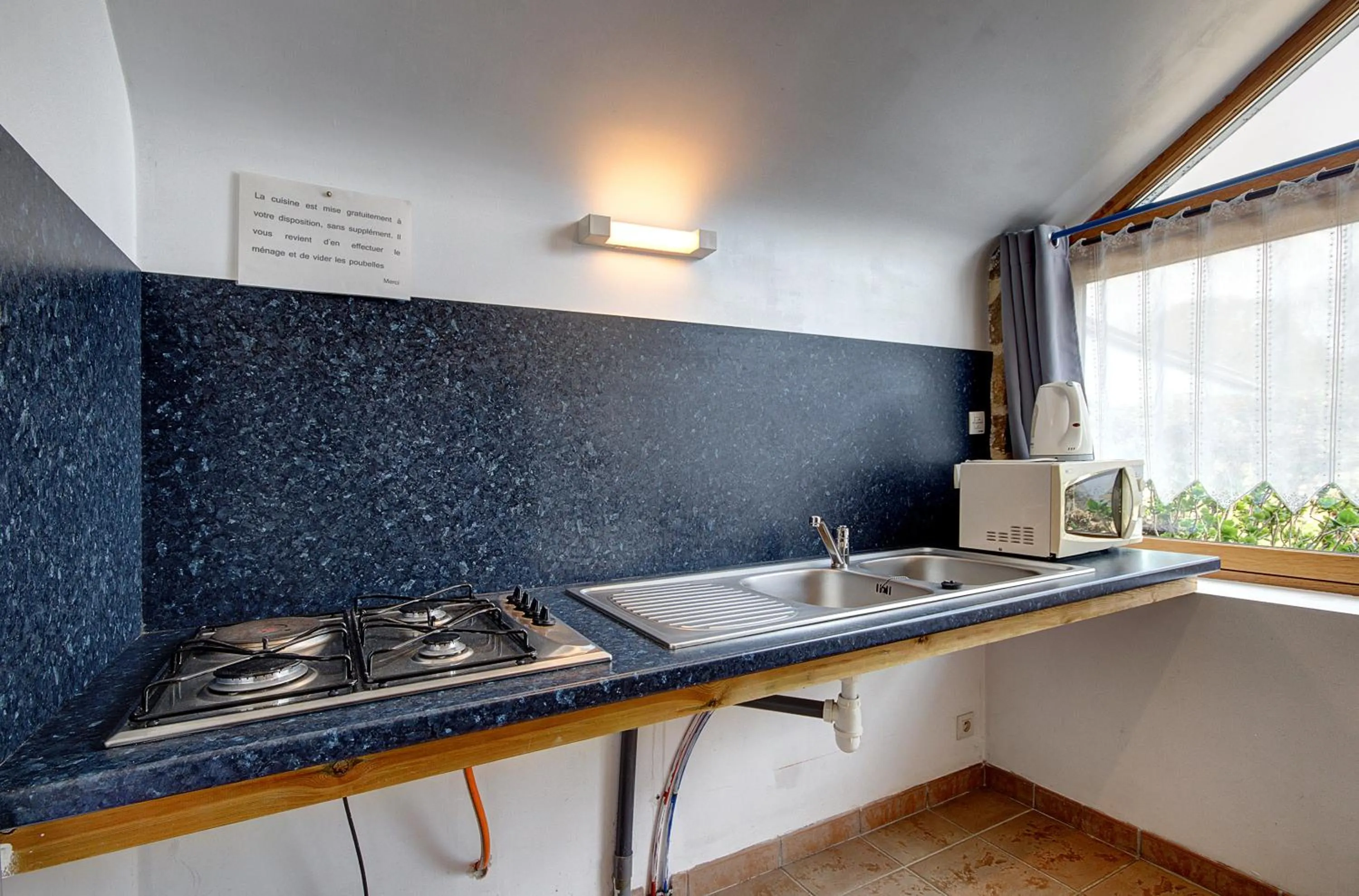 Kitchen or kitchenette in A la Ferme de Kervihern