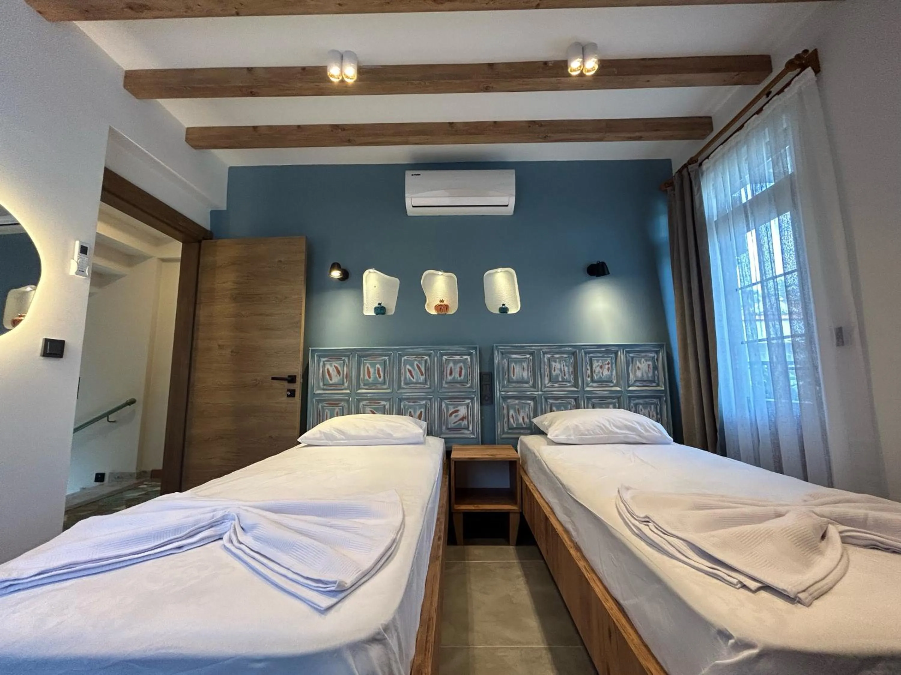 Bed in Avlu Villas & Apartments