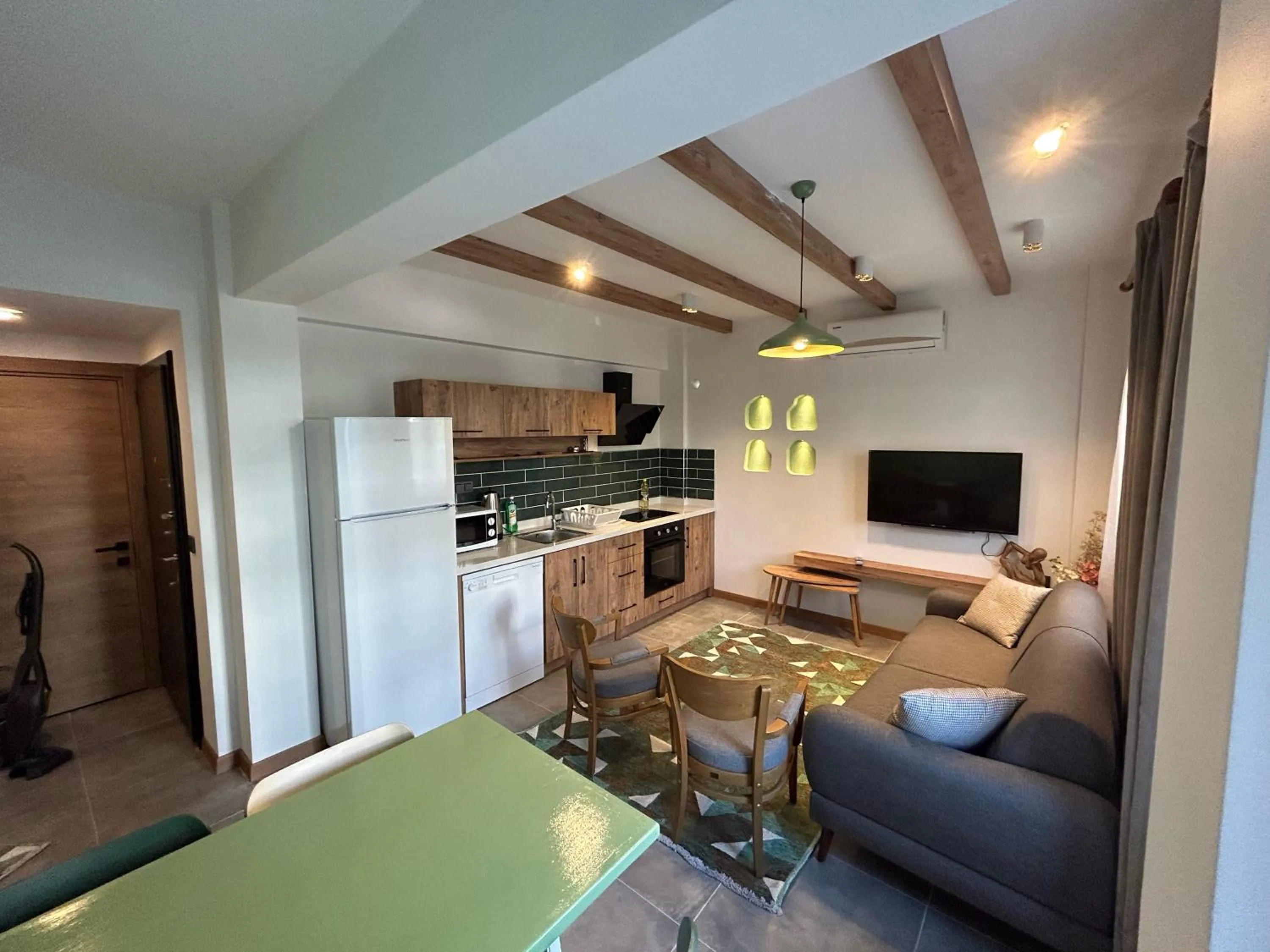 Communal lounge/ TV room in Avlu Villas & Apartments