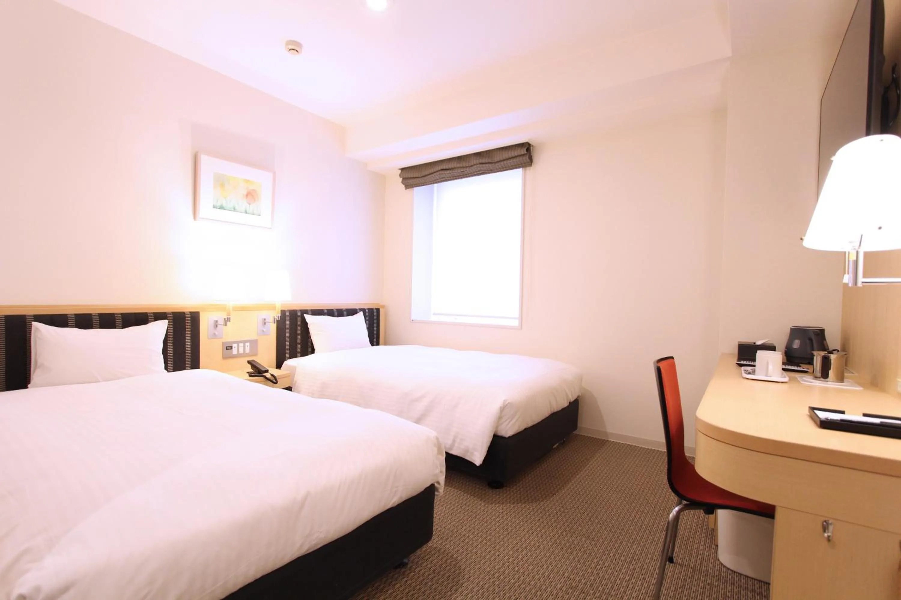 Photo of the whole room, Bed in KOKO HOTEL Sendai Station West