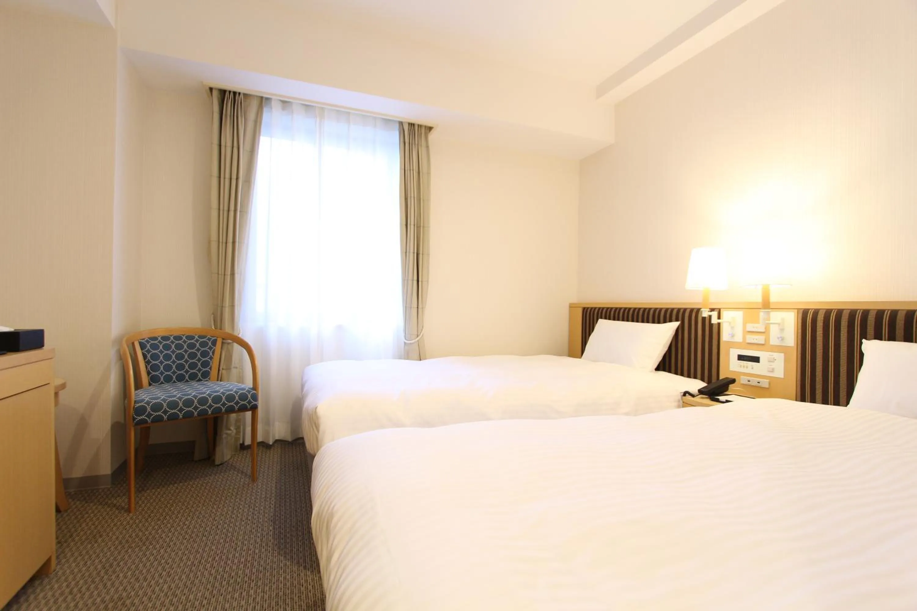 Photo of the whole room, Bed in KOKO HOTEL Sendai Station South