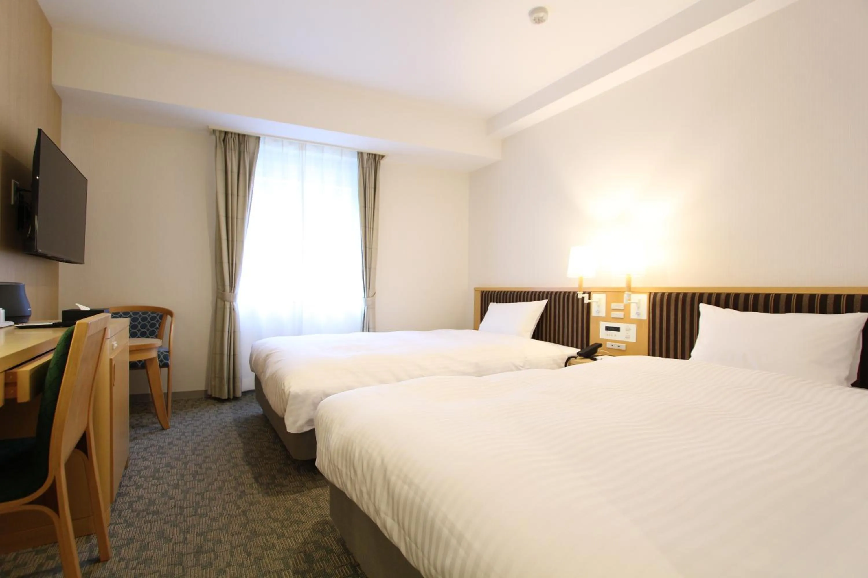 Photo of the whole room, Bed in KOKO HOTEL Sendai Station South