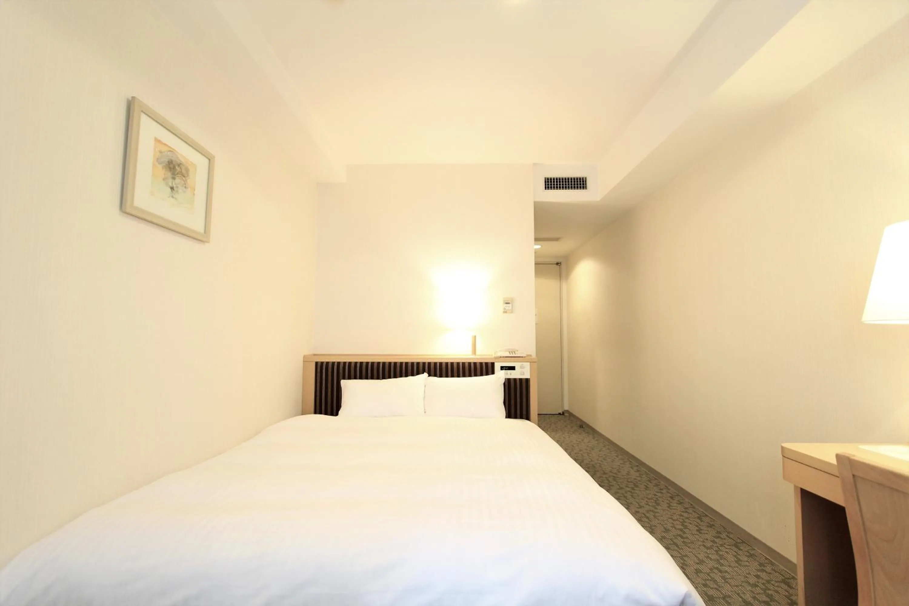 Photo of the whole room, Bed in KOKO HOTEL Sendai Station South