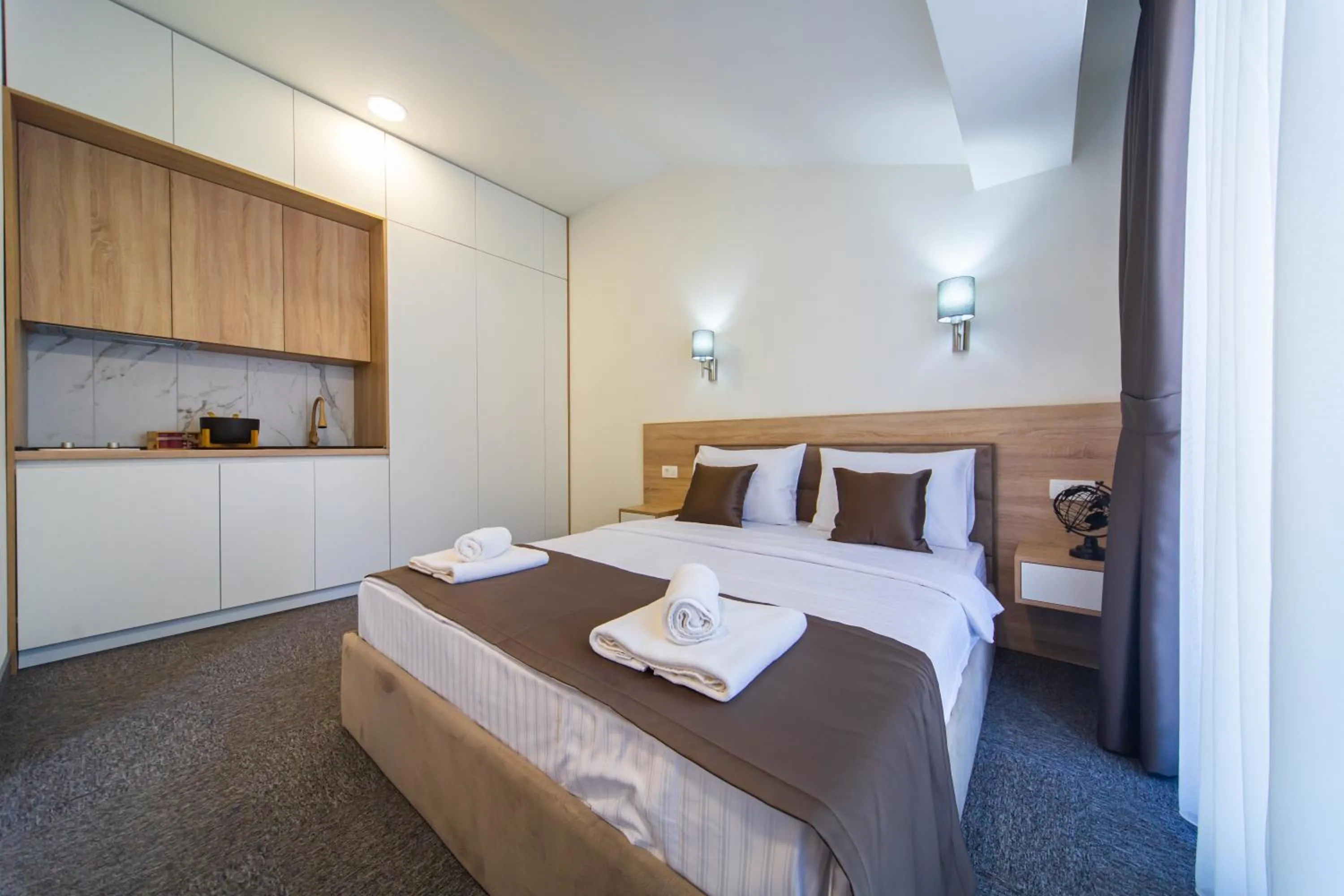 Bed in Rooftop Apartments & Rooms