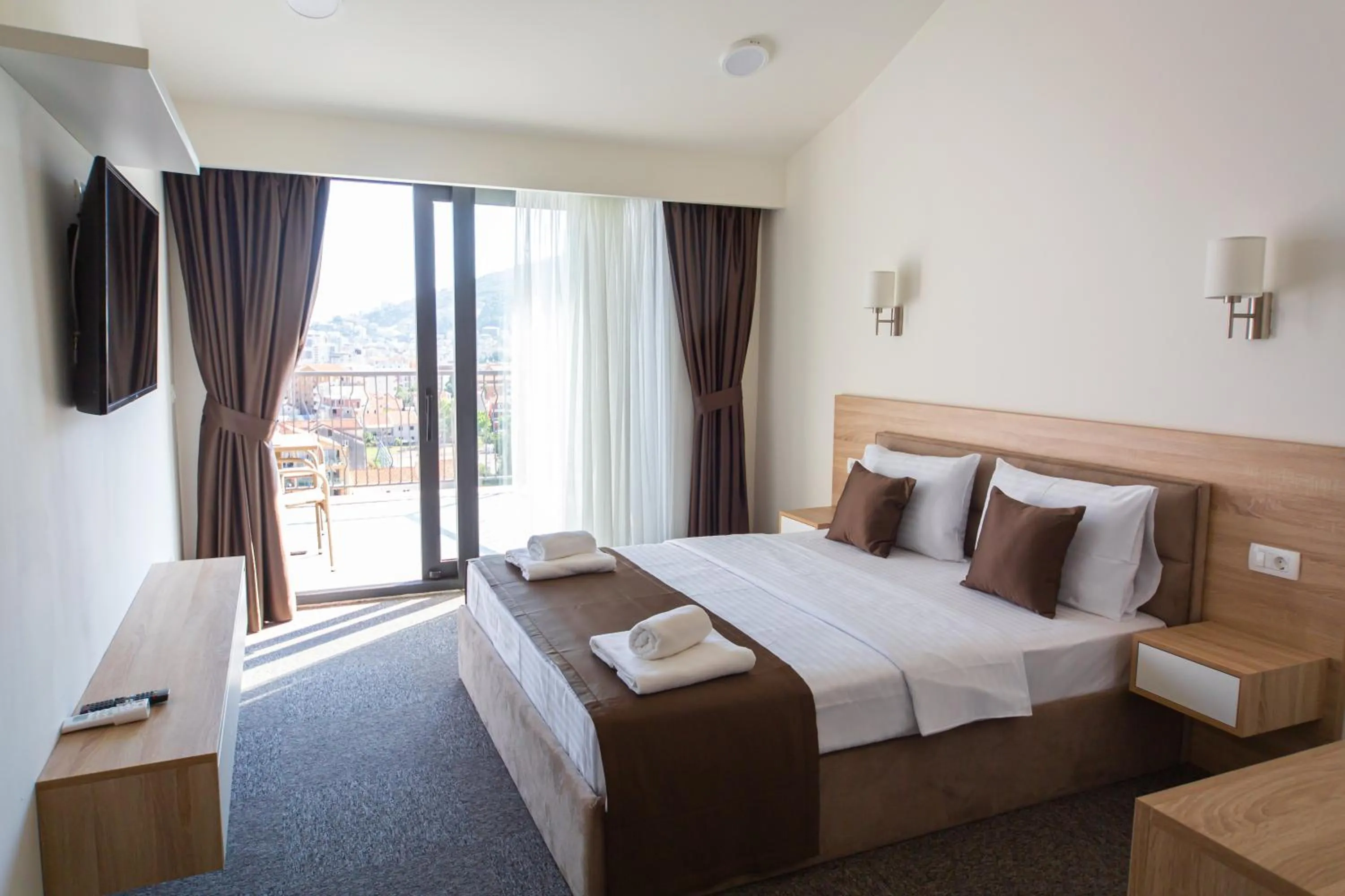 Bed in Rooftop Apartments & Rooms