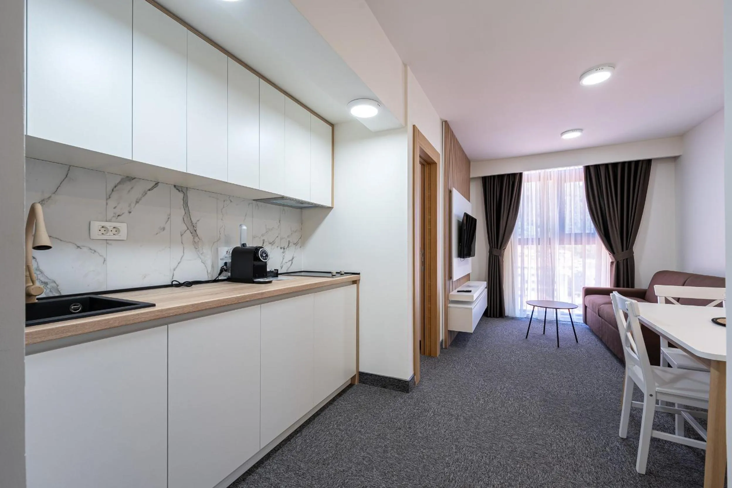 Kitchen or kitchenette in Rooftop Apartments & Rooms