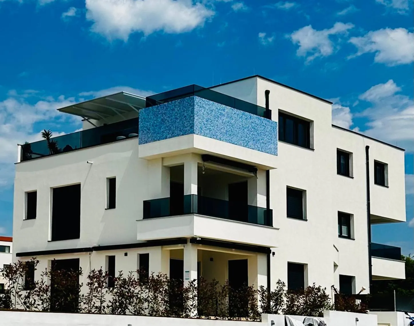 Property building in Penthouse Blue Horizon- a luxury penthouse with infinity pool, hot tub, sauna and sea views!