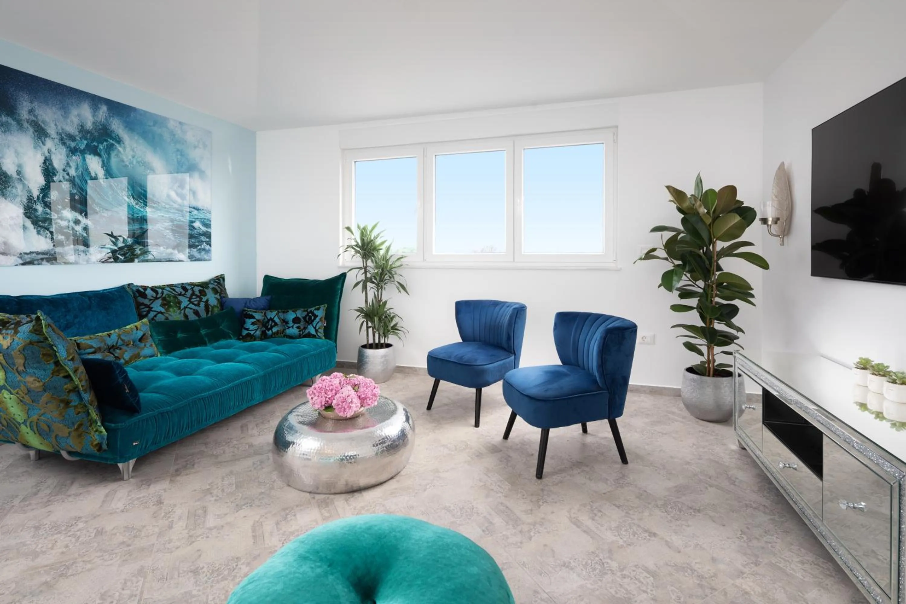 Living room in Penthouse Blue Horizon- a luxury penthouse with infinity pool, hot tub, sauna and sea views!