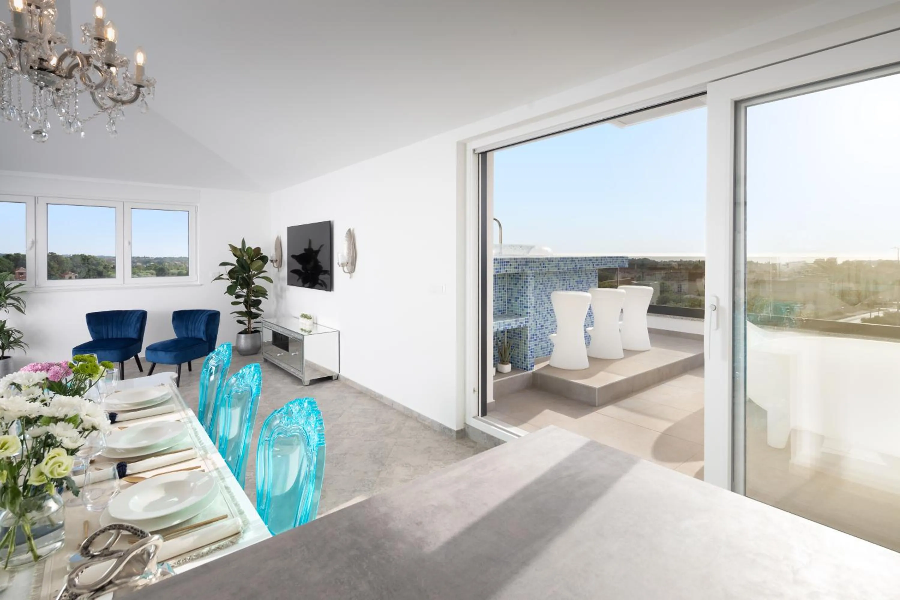 TV and multimedia in Penthouse Blue Horizon- a luxury penthouse with infinity pool, hot tub, sauna and sea views!