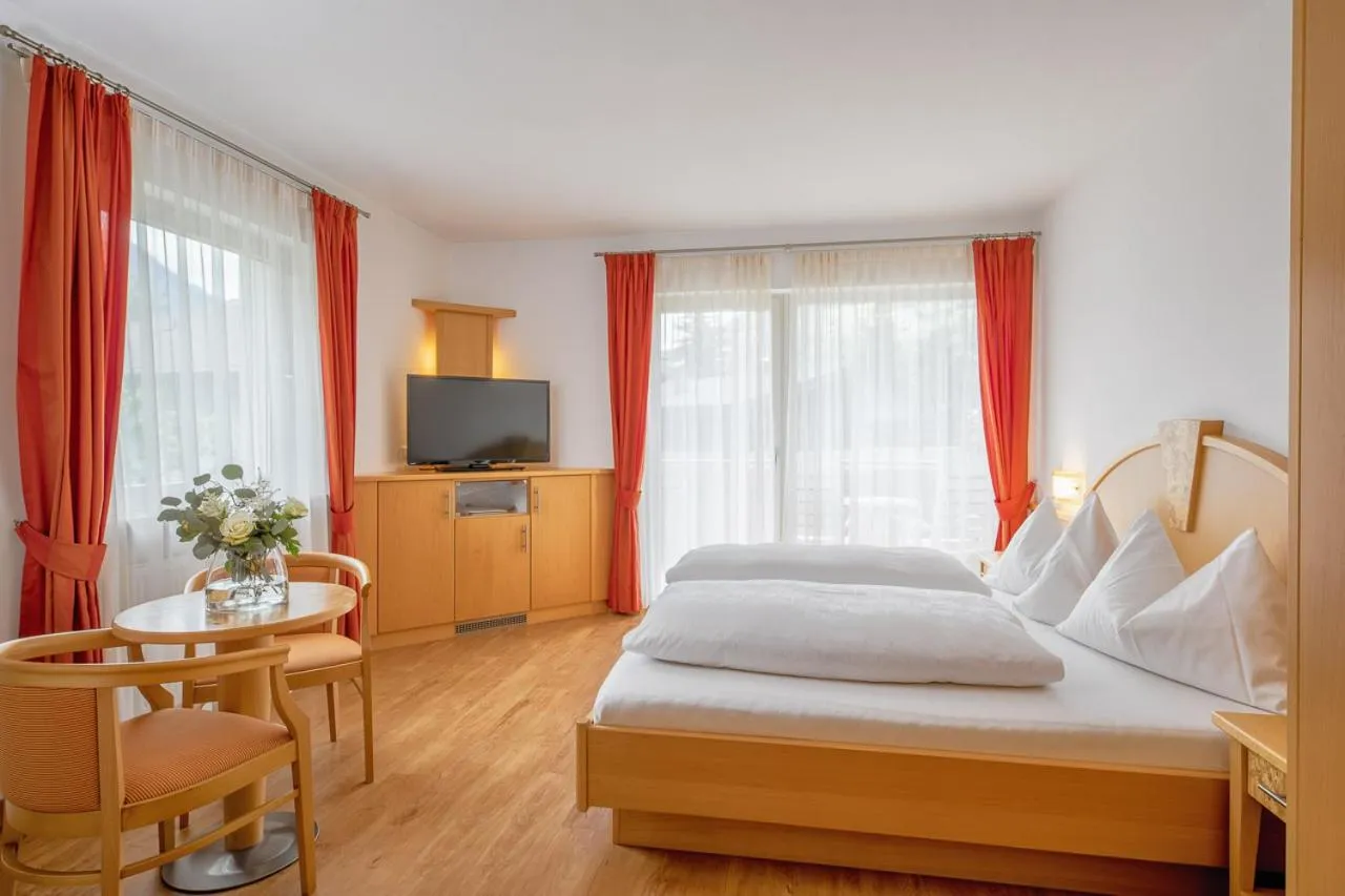 Photo of the whole room, Bed in Garni Hotel Am Meilenstein