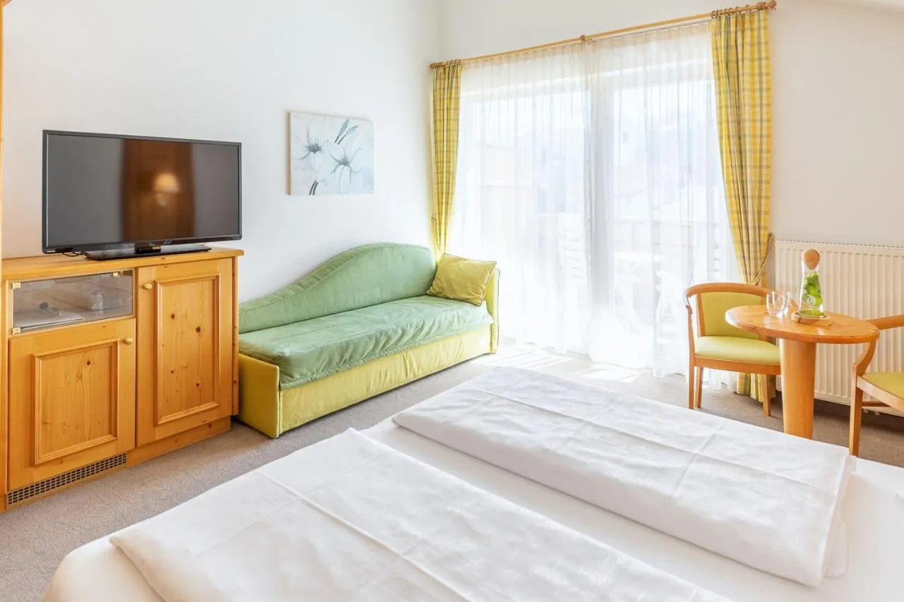 Photo of the whole room, Bed in Garni Hotel Am Meilenstein