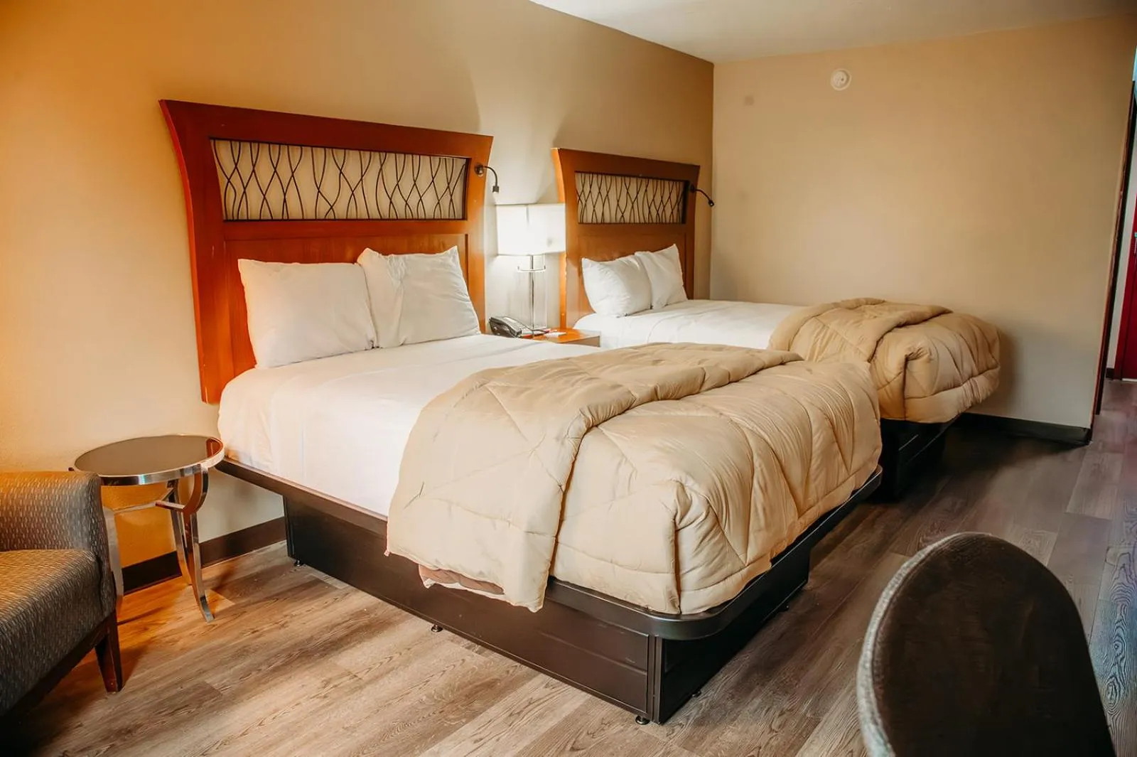 Bed in Country Garden & Suites