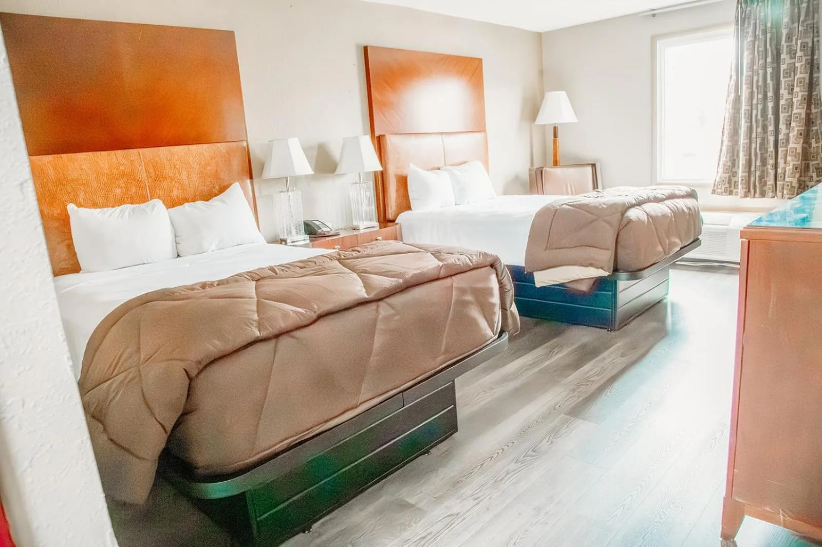 Bed in Country Garden & Suites