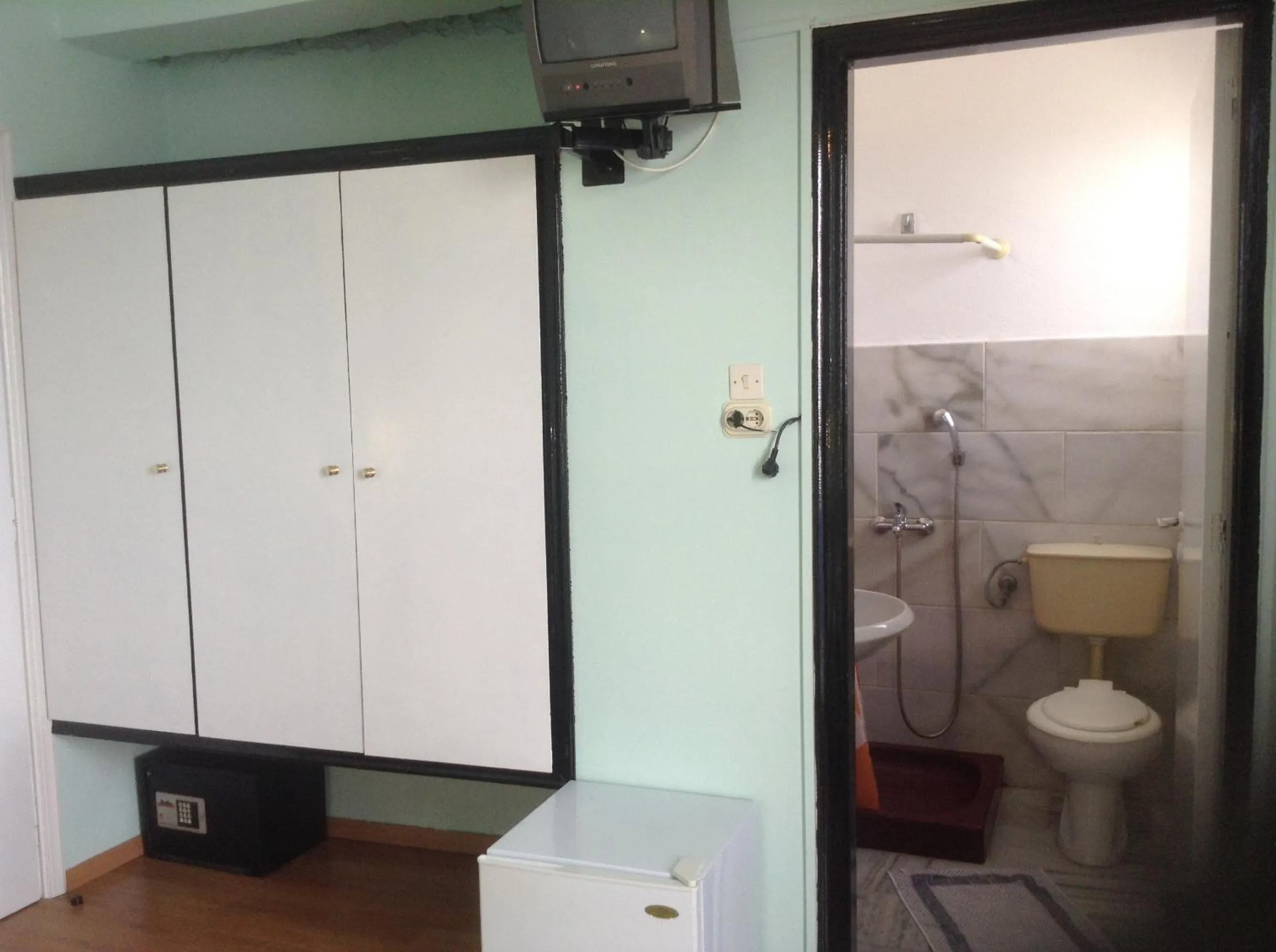 Bathroom in Haritos Hotel - Geothermal Hot Swimming Pool