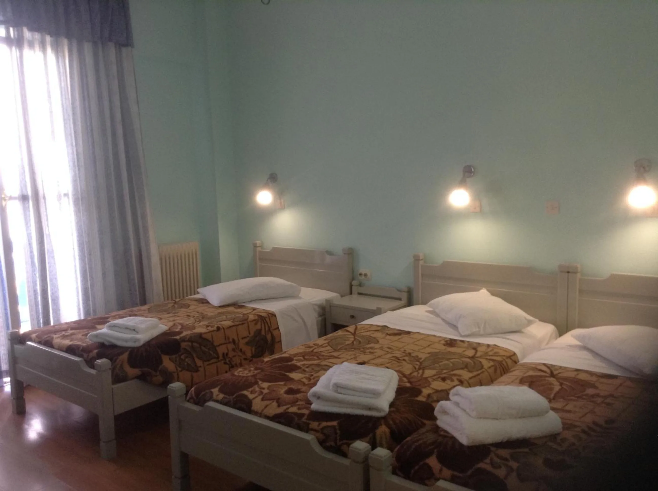 Bedroom in Haritos Hotel - Geothermal Hot Swimming Pool