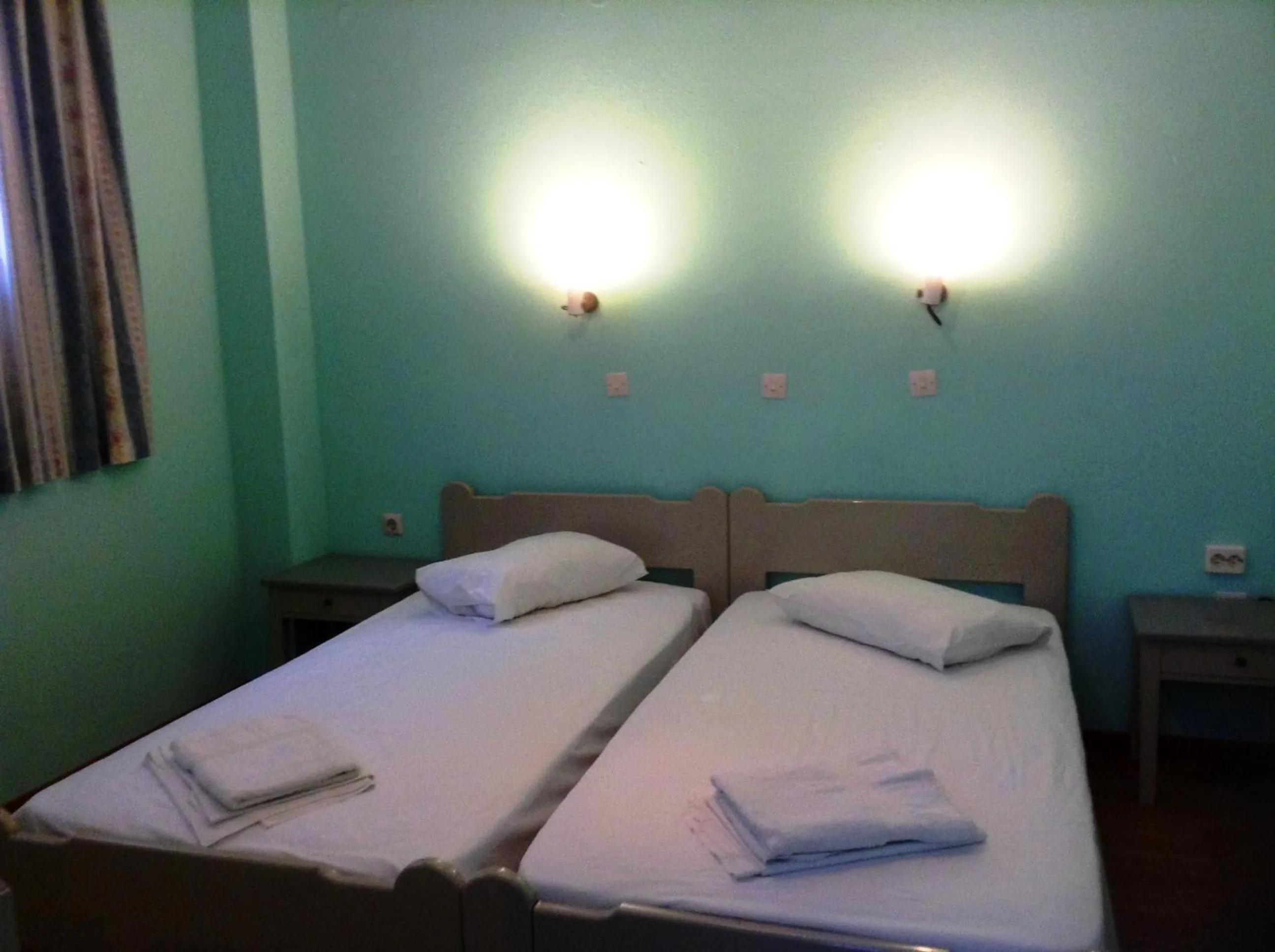 Bed in Haritos Hotel - Geothermal Hot Swimming Pool