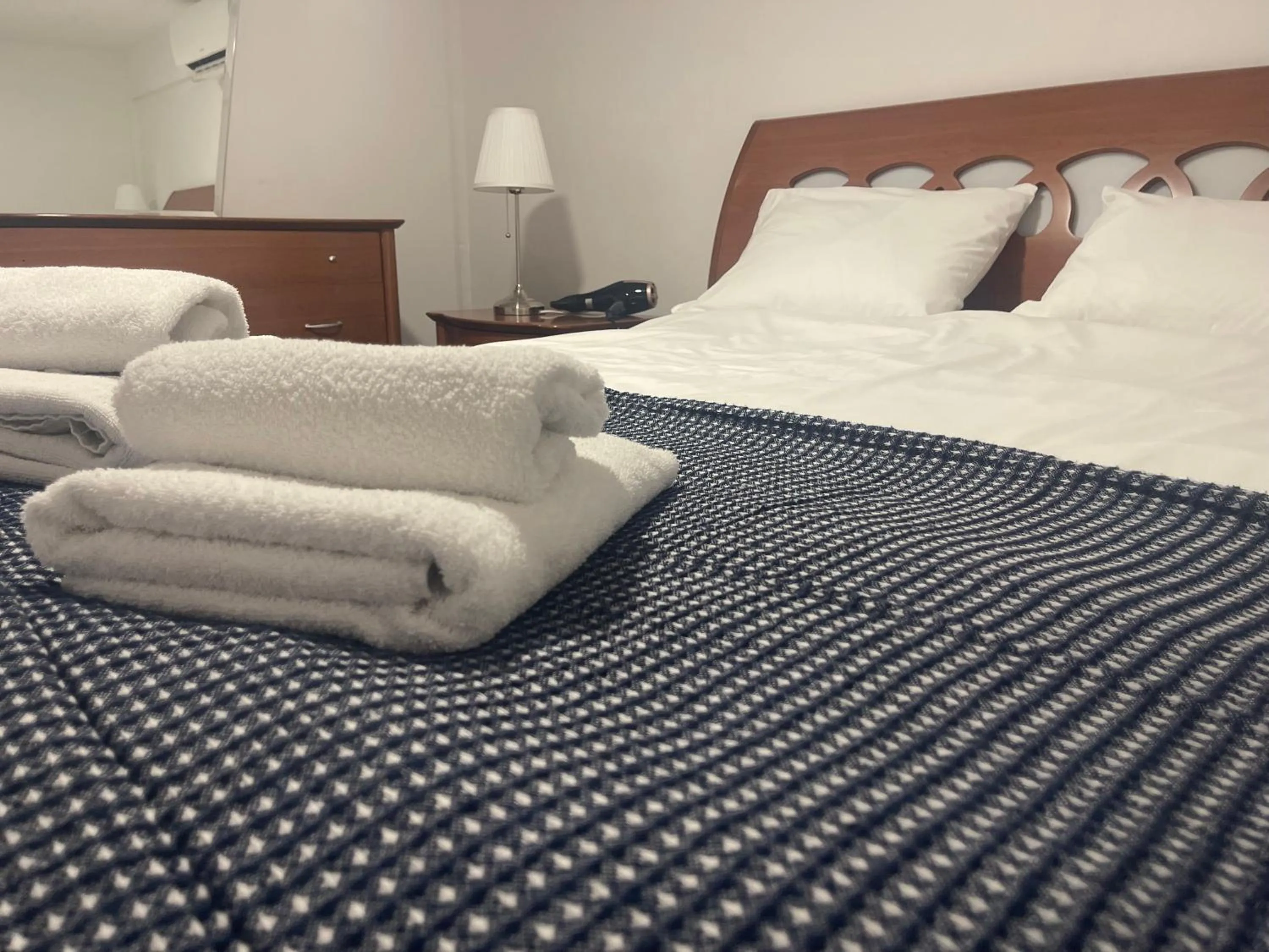 Bed in Stephanie City Apartments