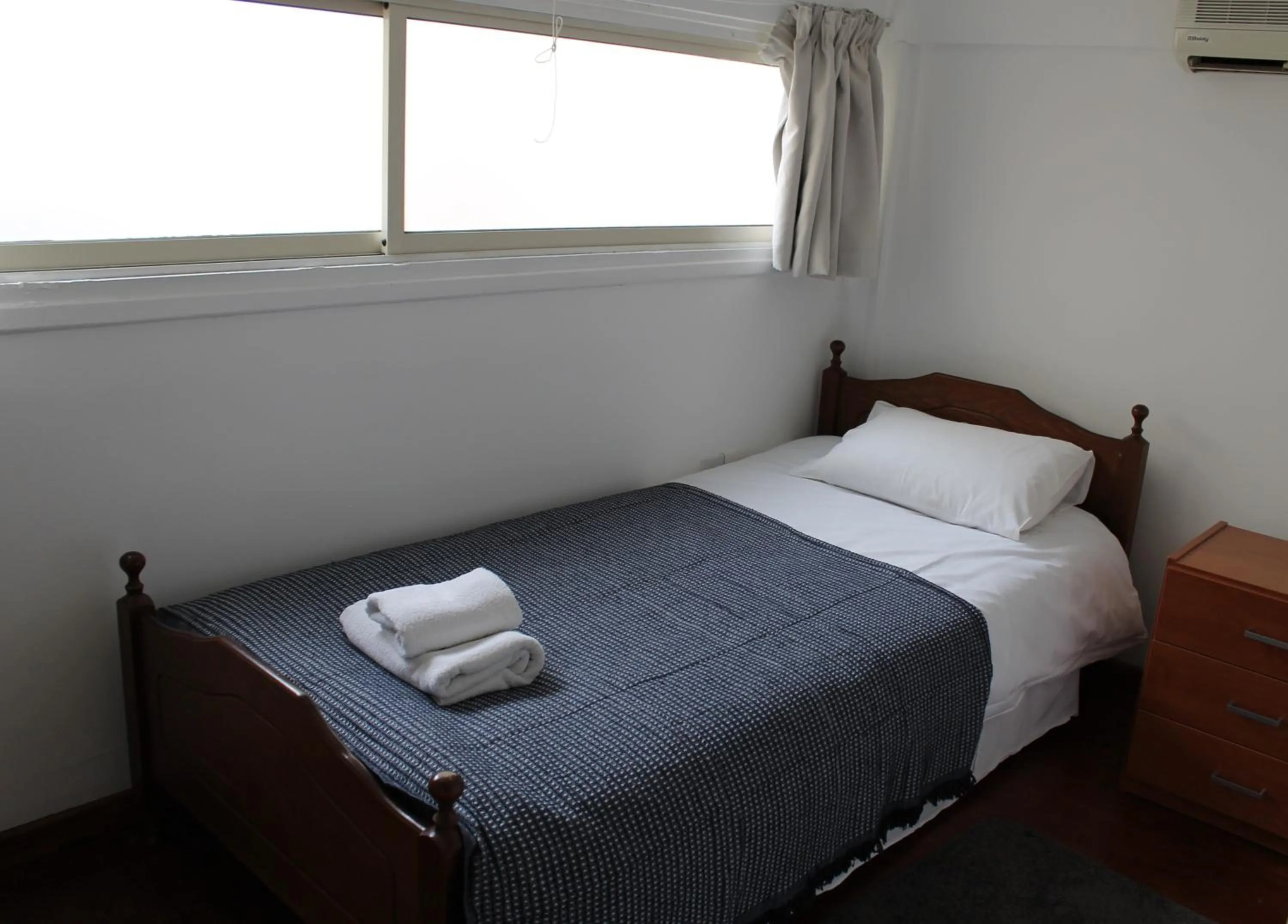 Bed in Stephanie City Apartments