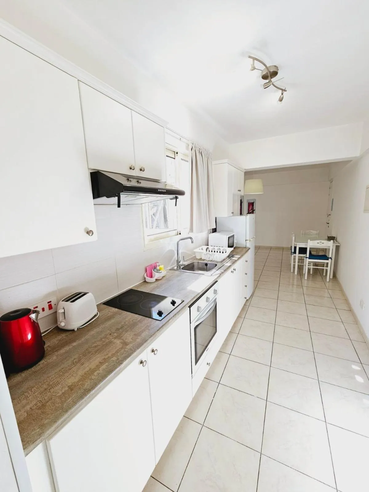 Kitchen or kitchenette in Stephanie City Apartments