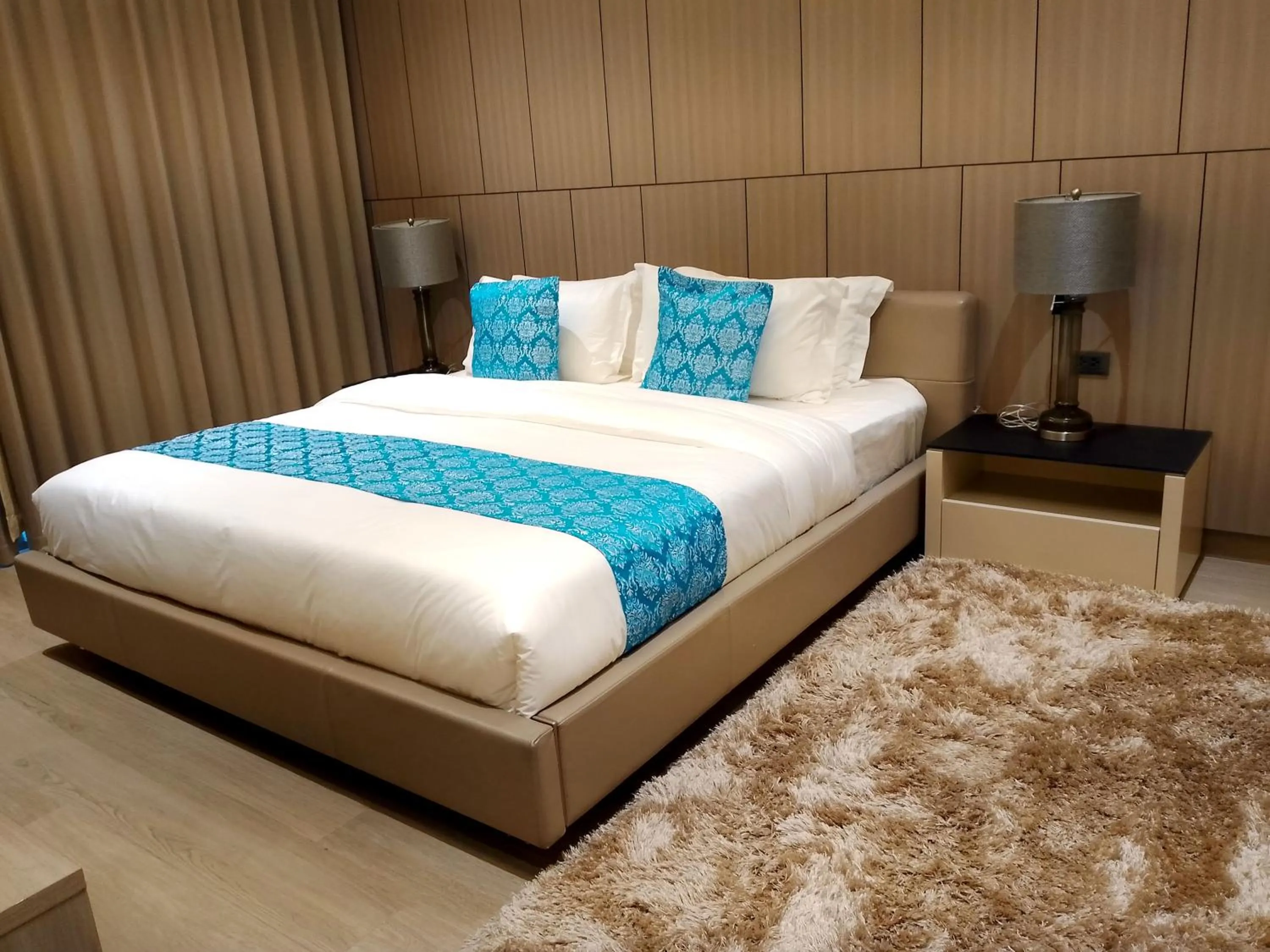 Bed in Bayprime Hotel