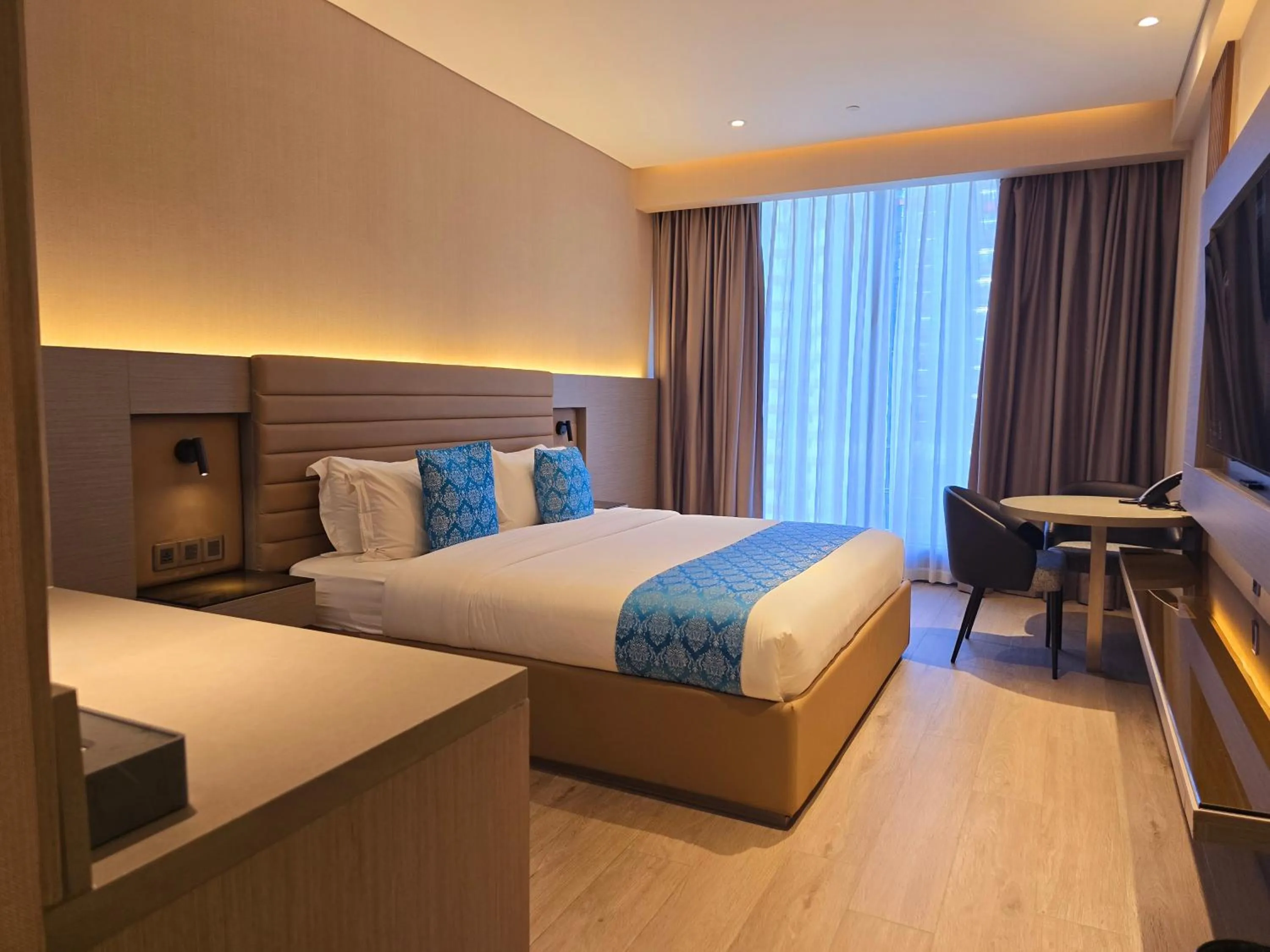 Bed in Bayprime Hotel