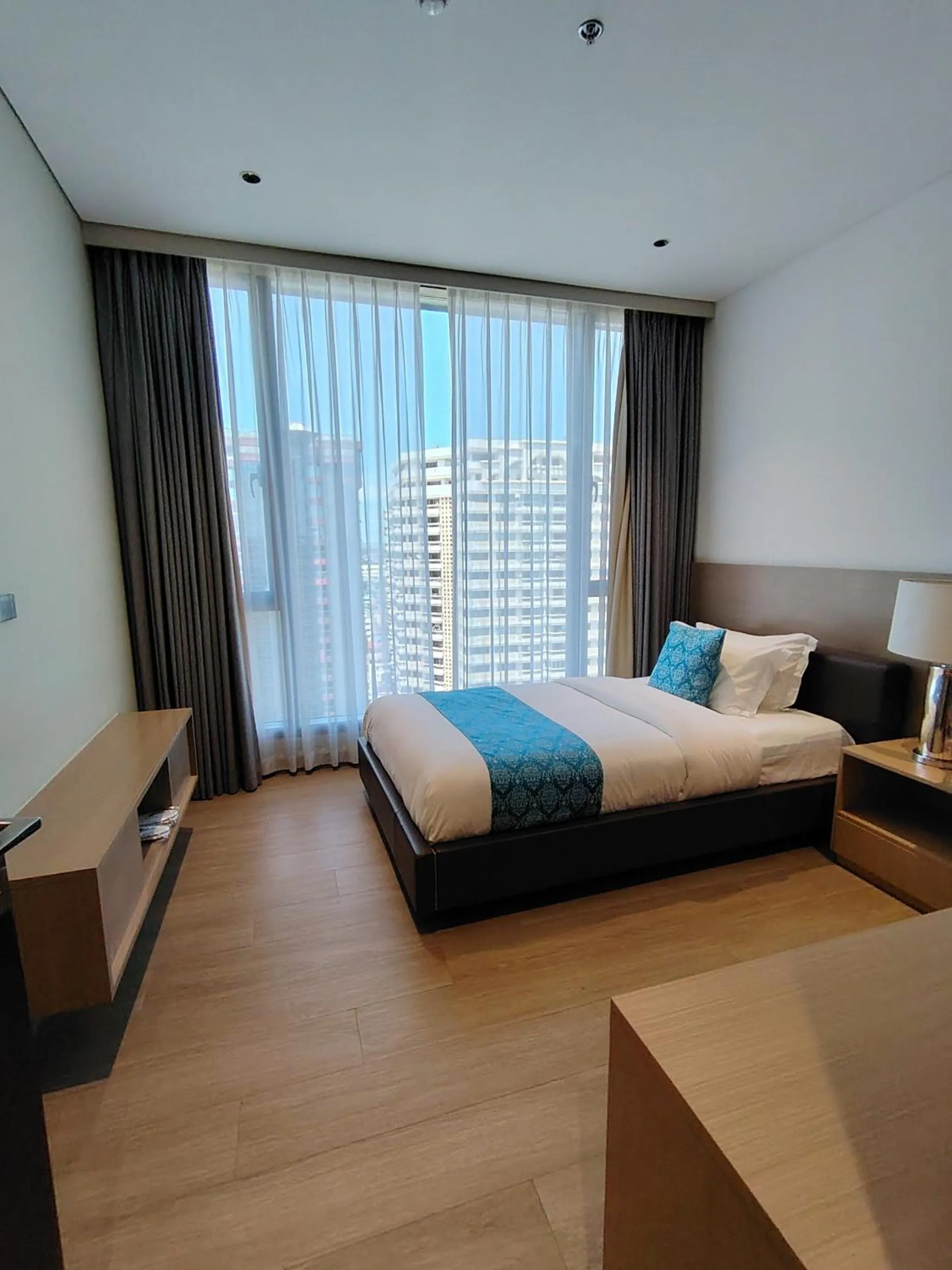 Bed in Bayprime Hotel