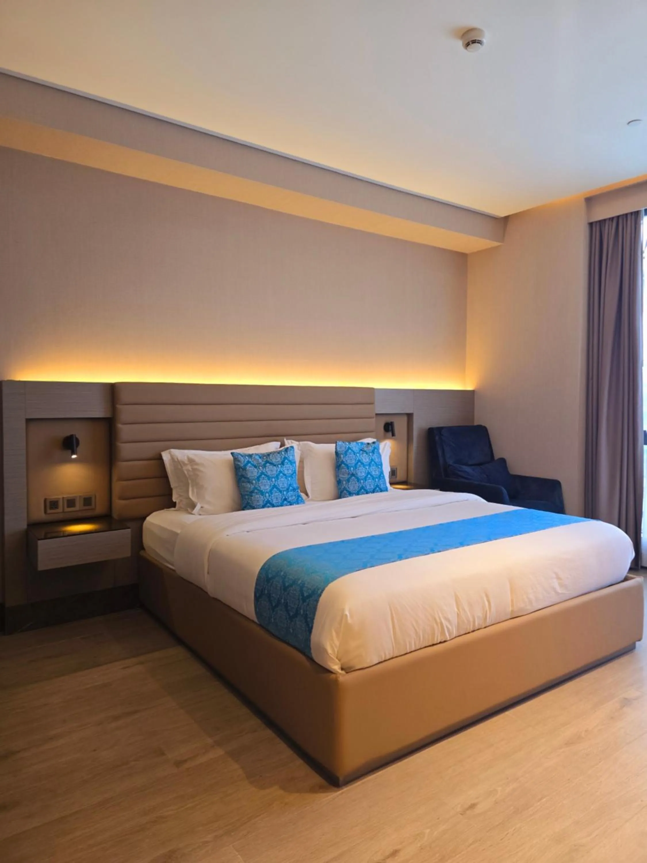 Bed in Bayprime Hotel