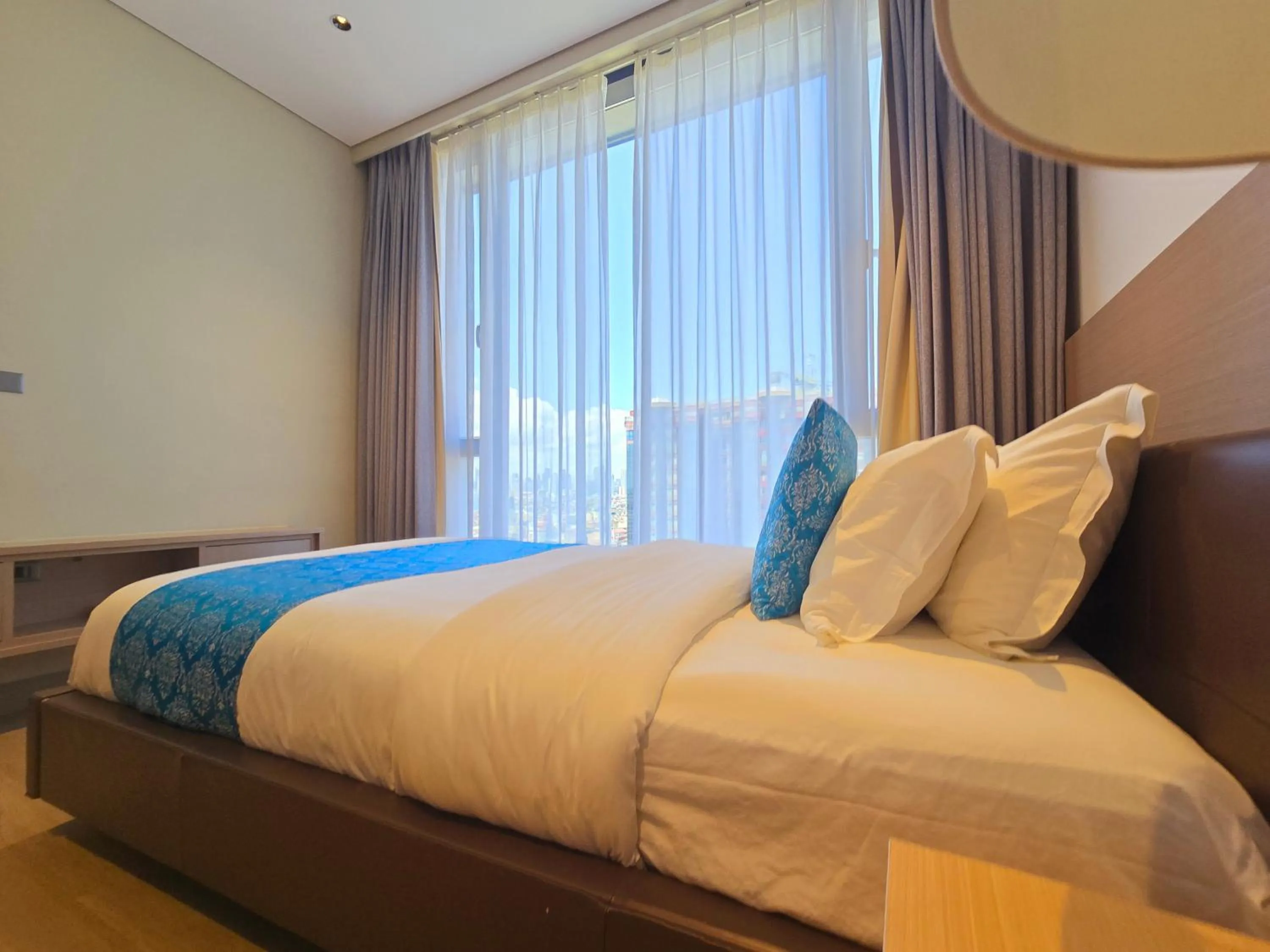 Bed in Bayprime Hotel