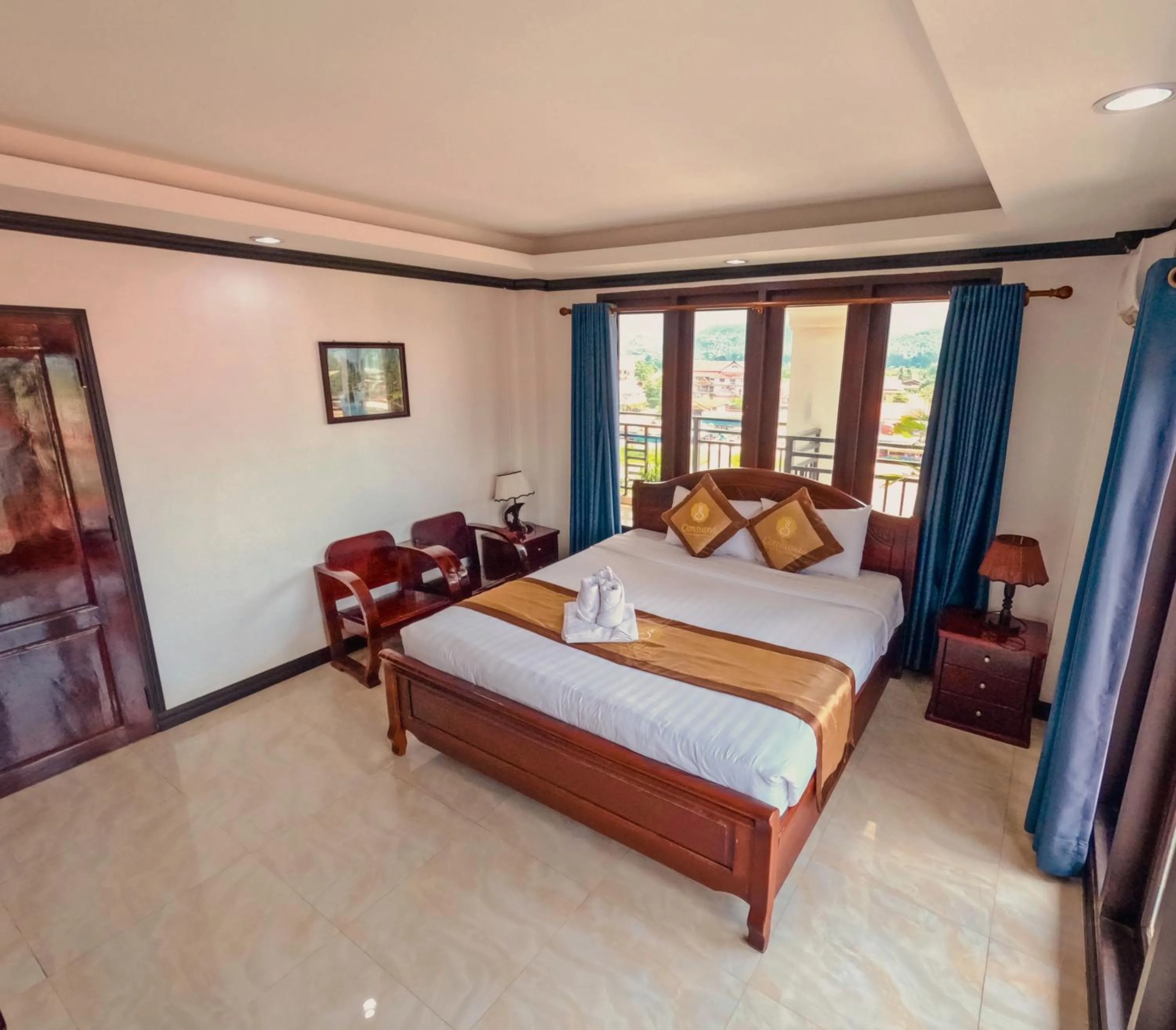 Bed in Vang Vieng Consiana Hotel