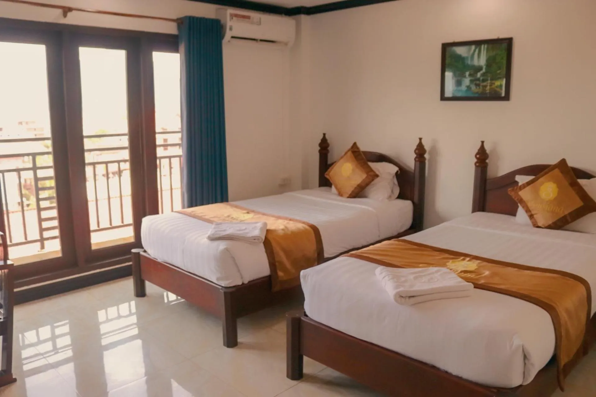 Bed in Vang Vieng Consiana Hotel