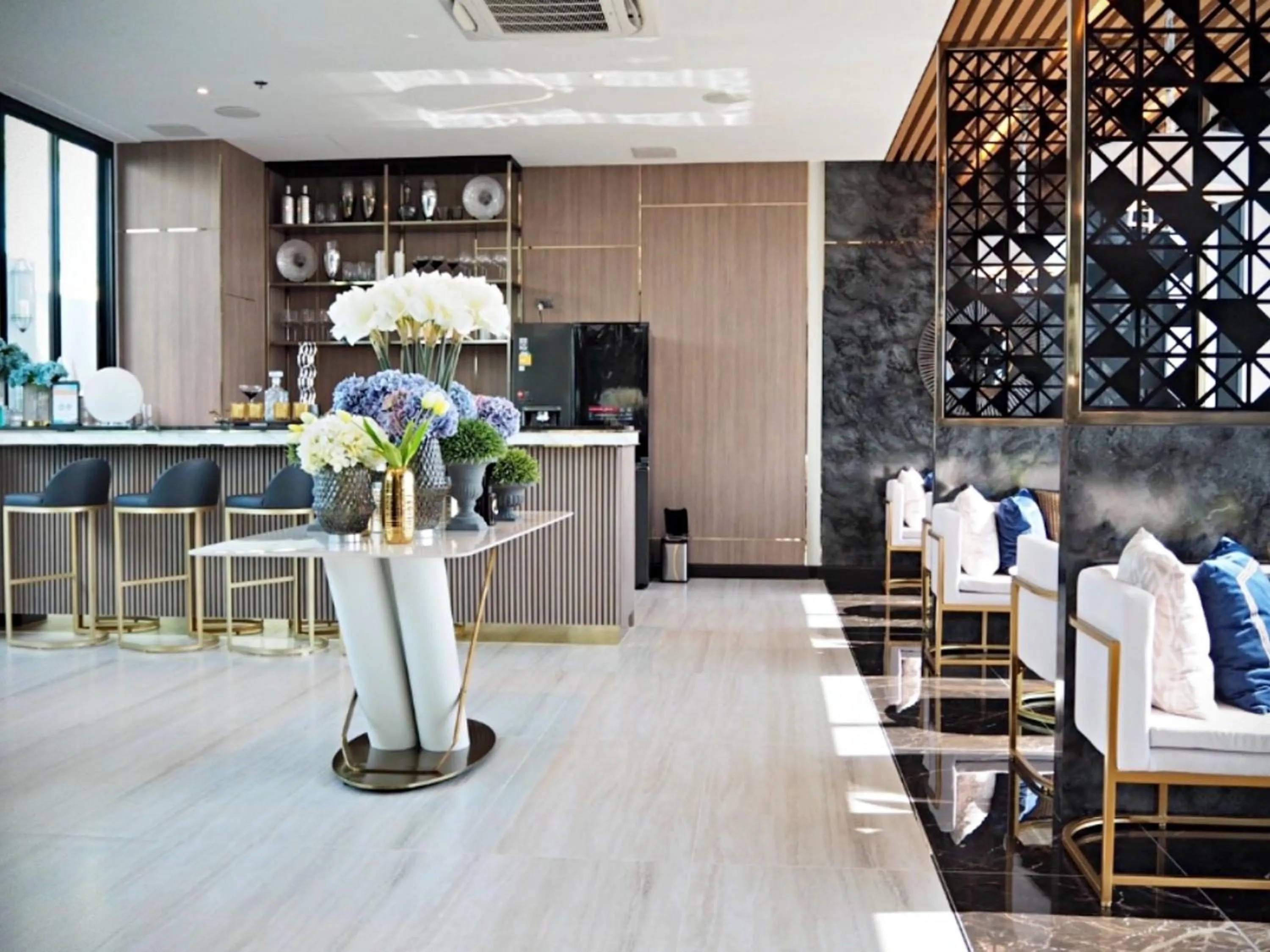 Communal lounge/ TV room in Astra Sky River Chiang Mai by Fang