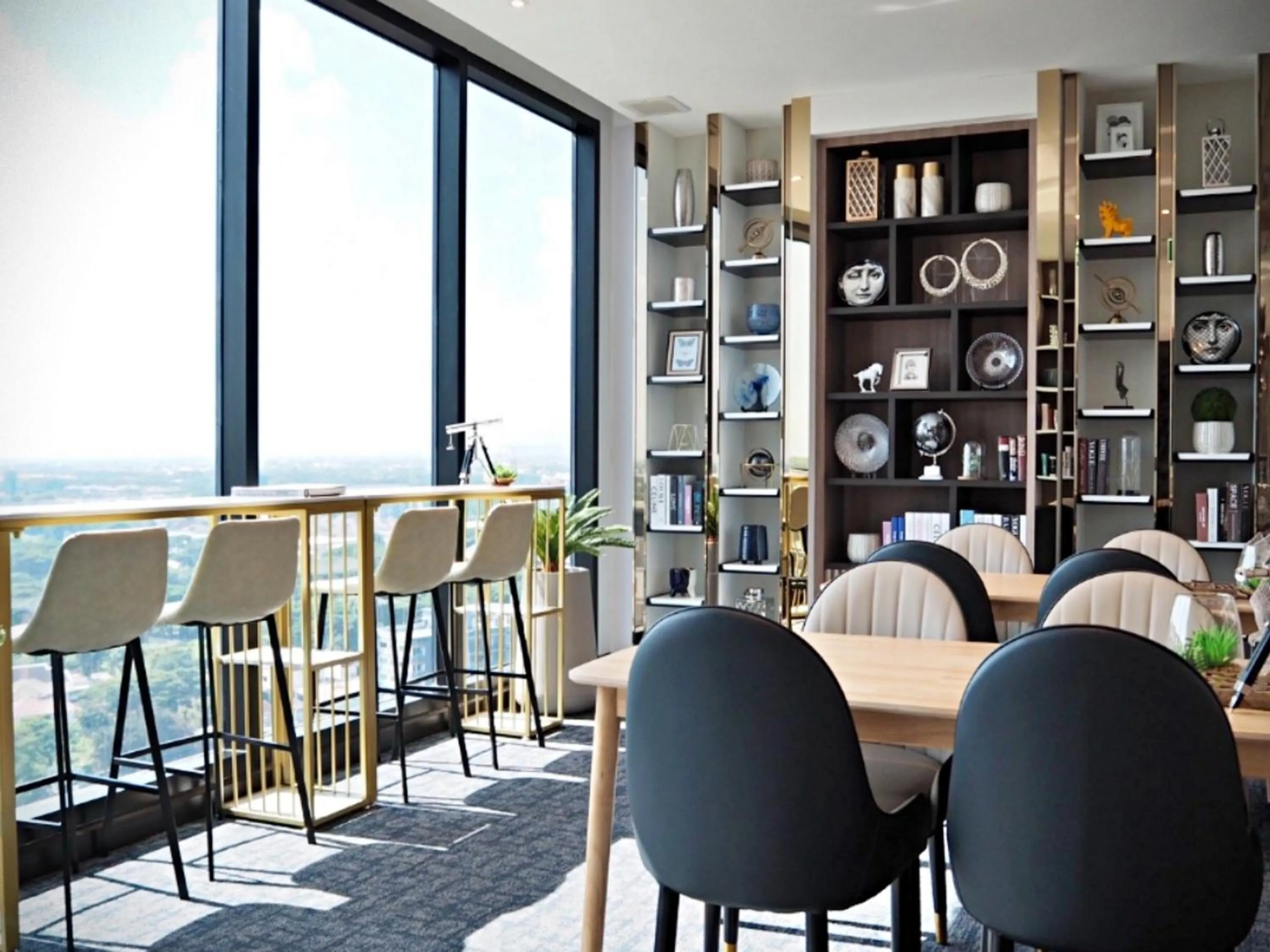 Communal lounge/ TV room in Astra Sky River Chiang Mai by Fang