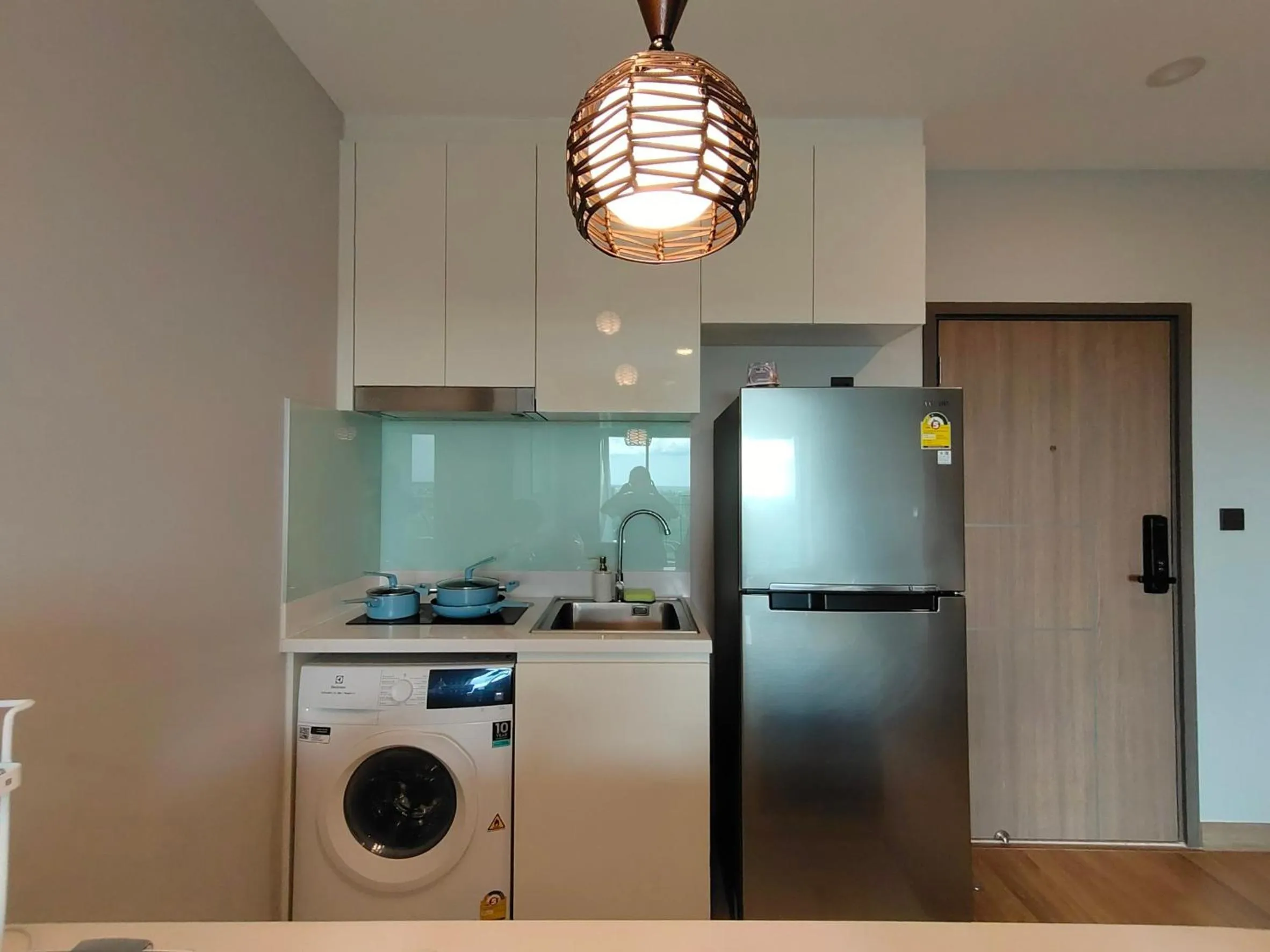 Kitchen or kitchenette in Astra Sky River Chiang Mai by Fang