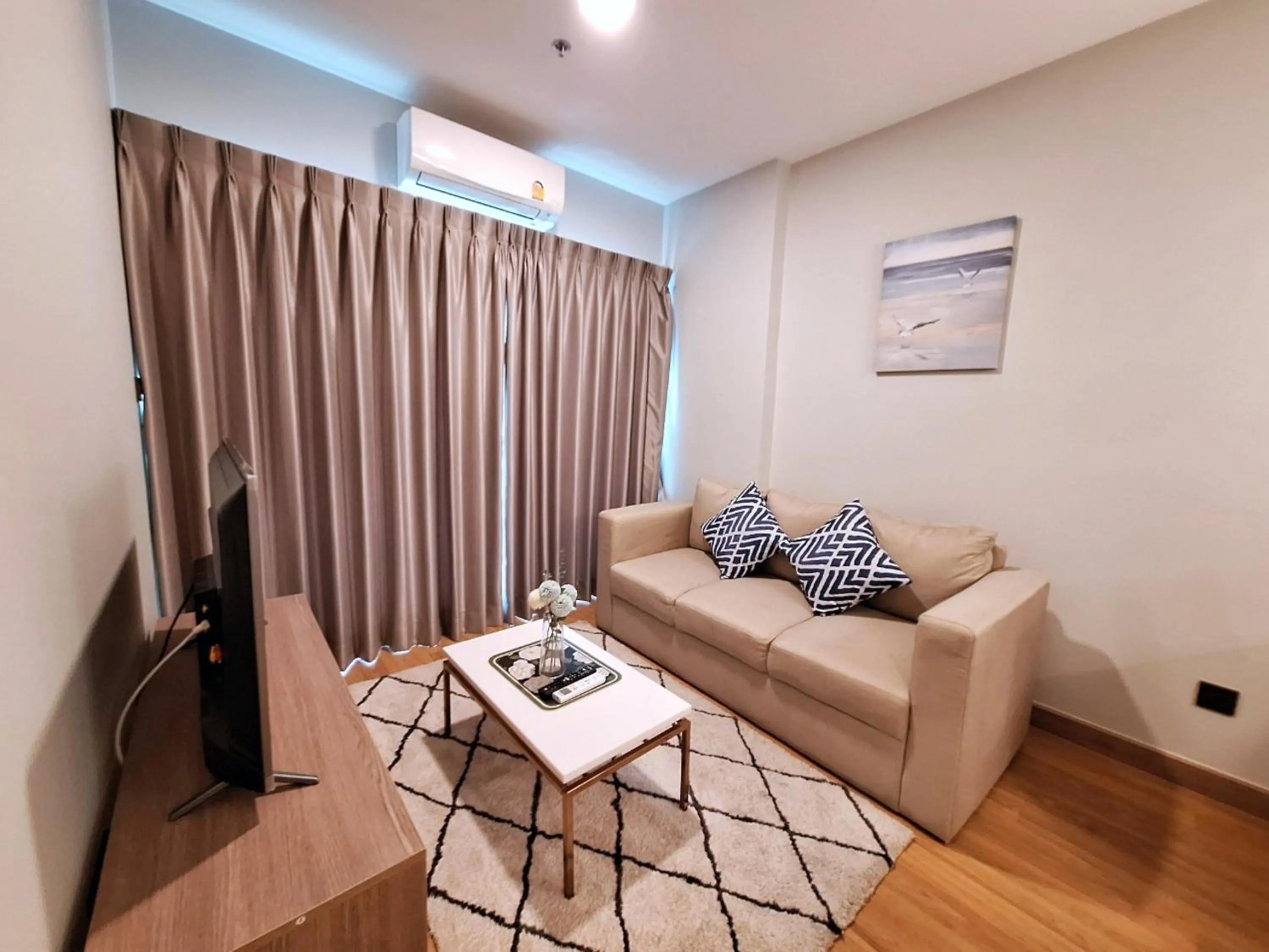 Living room in Astra Sky River Chiang Mai by Fang