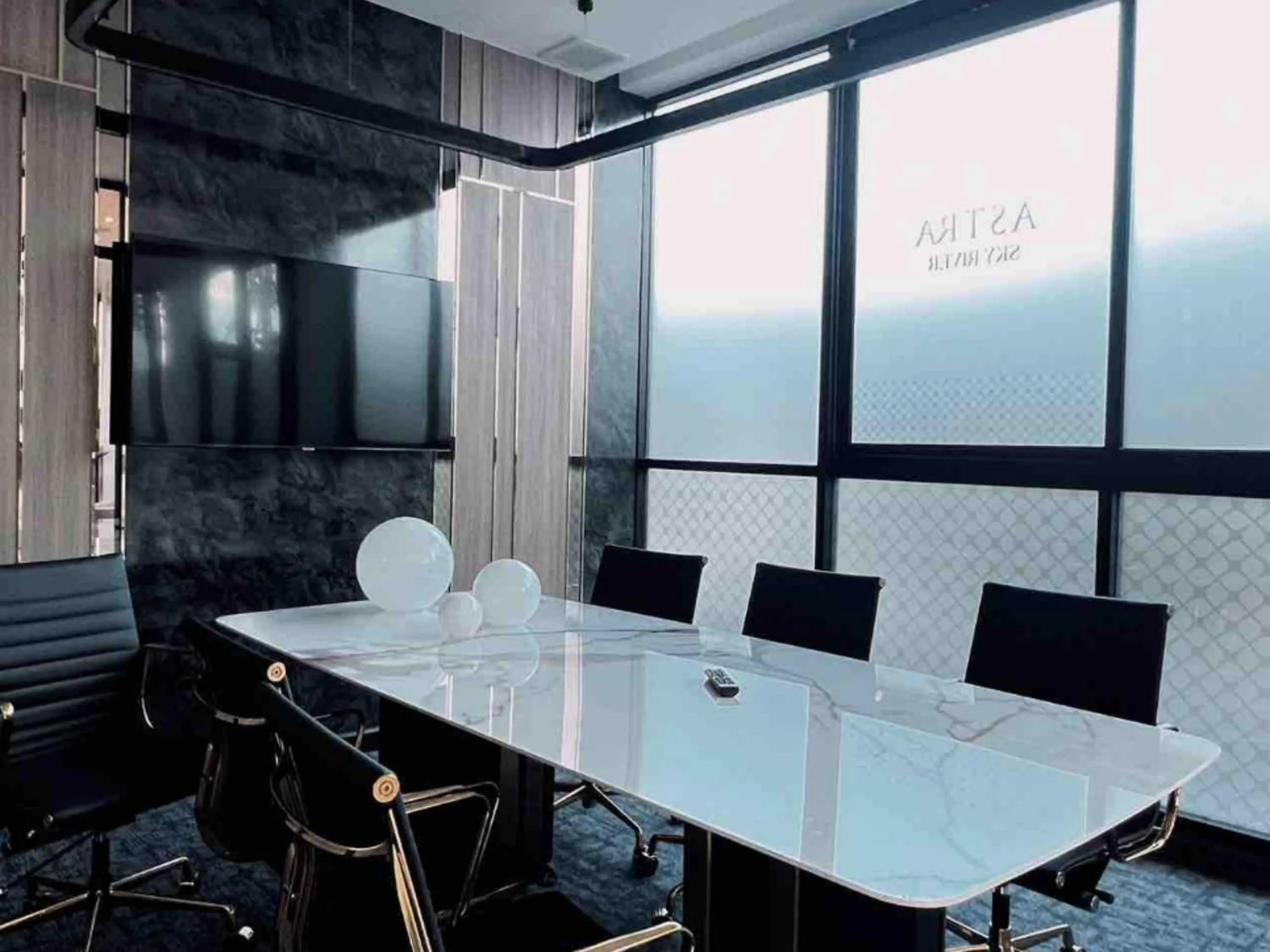 Communal lounge/ TV room in Astra Sky River Chiang Mai by Fang