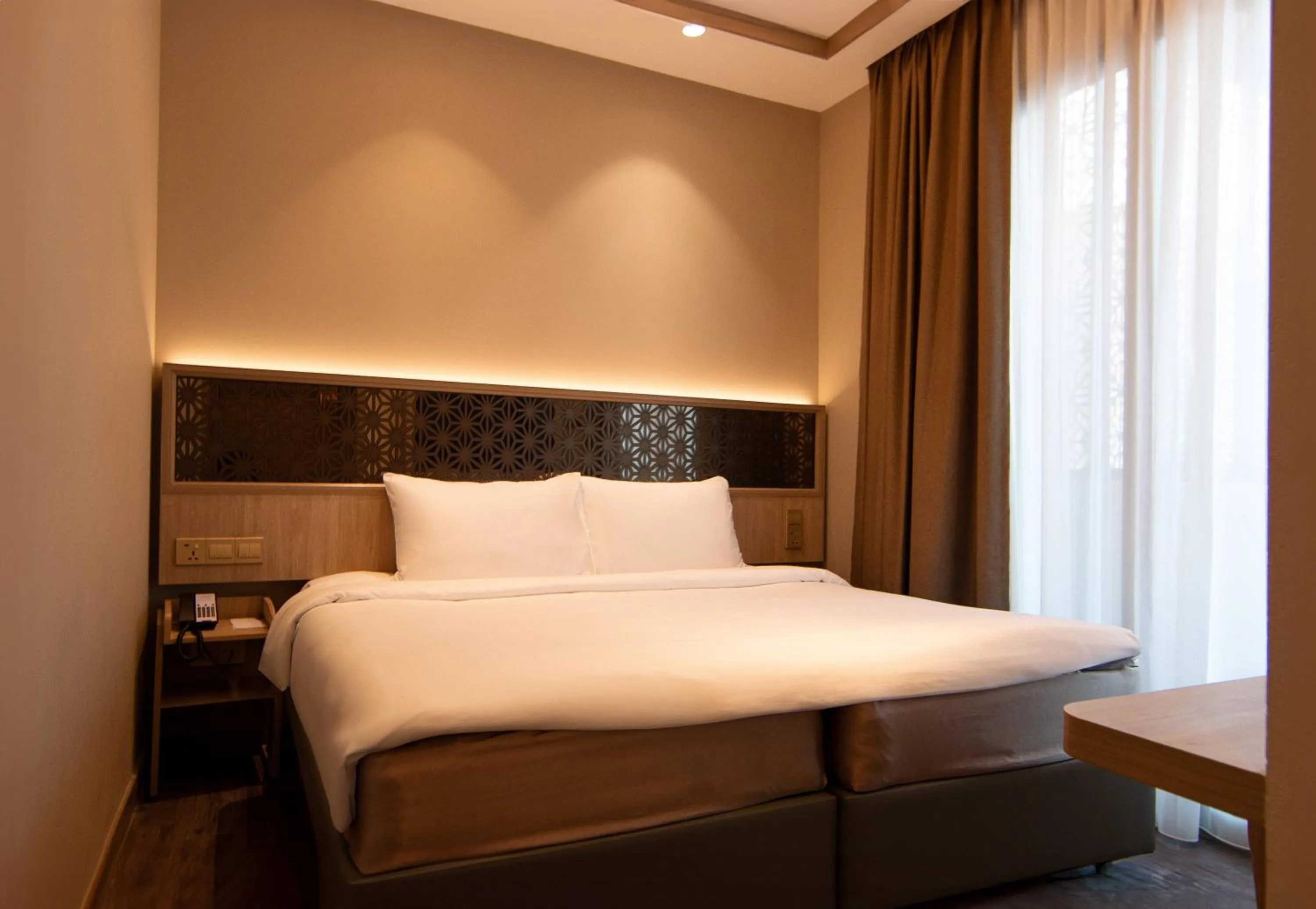 Bed in Aqueen Prestige Hotel Jalan Besar