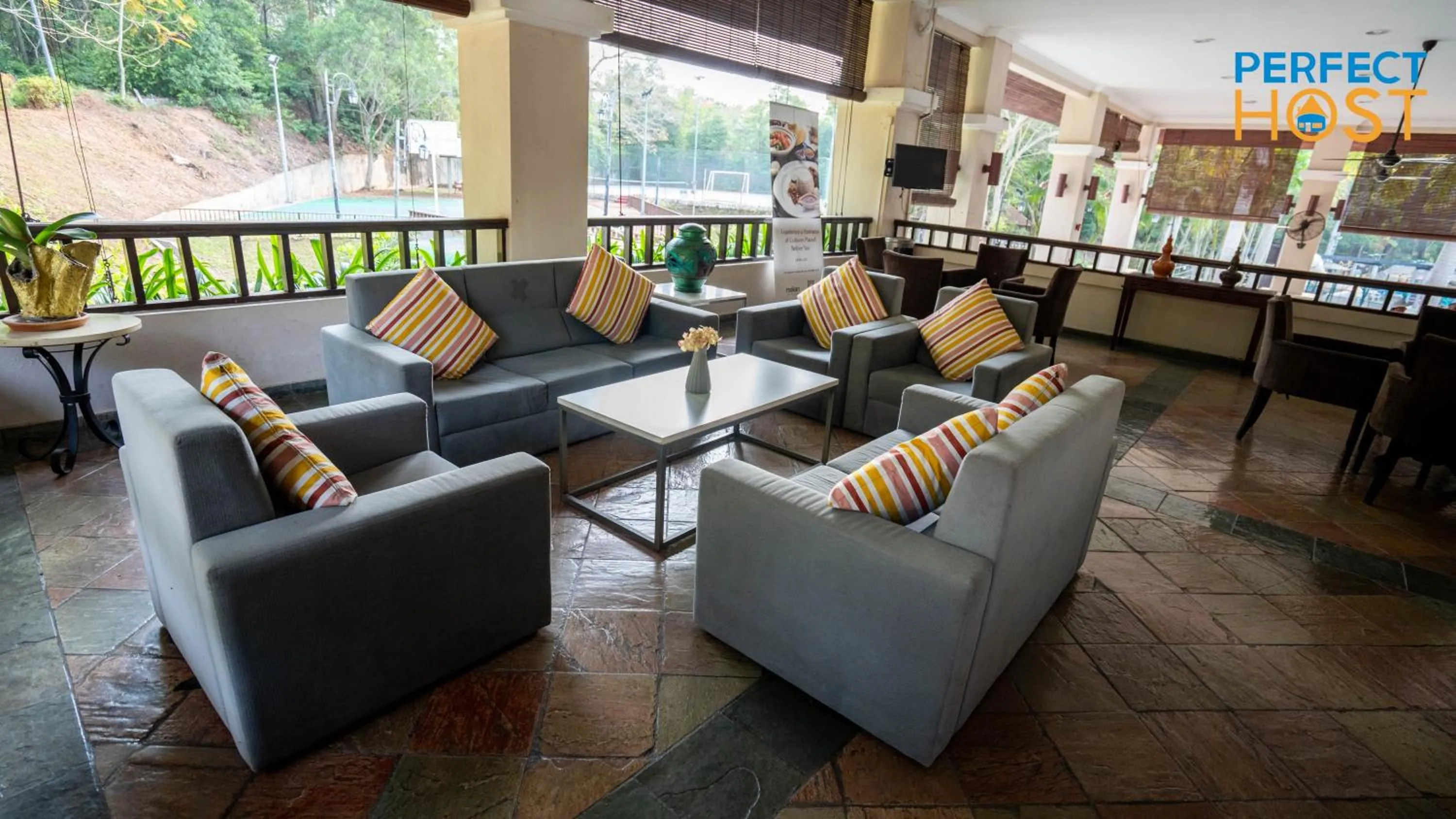 Seating area in Damai Laut Escape by Perfect Host