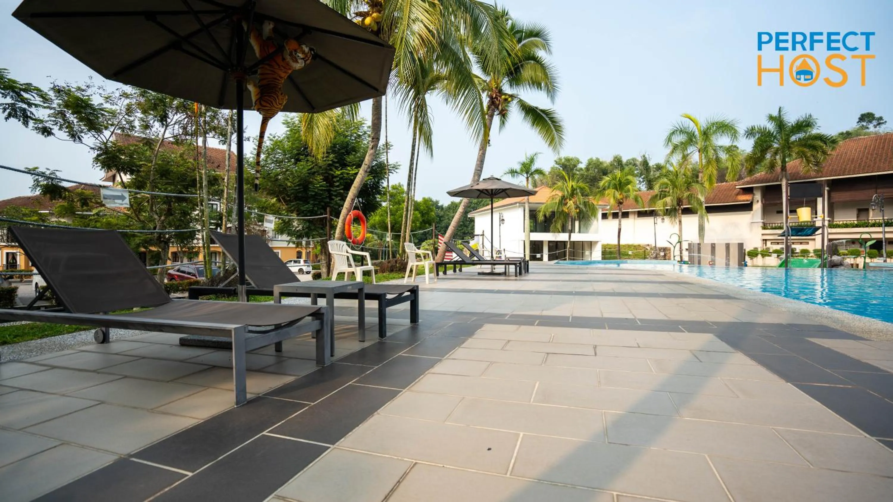 Swimming pool in Damai Laut Escape by Perfect Host