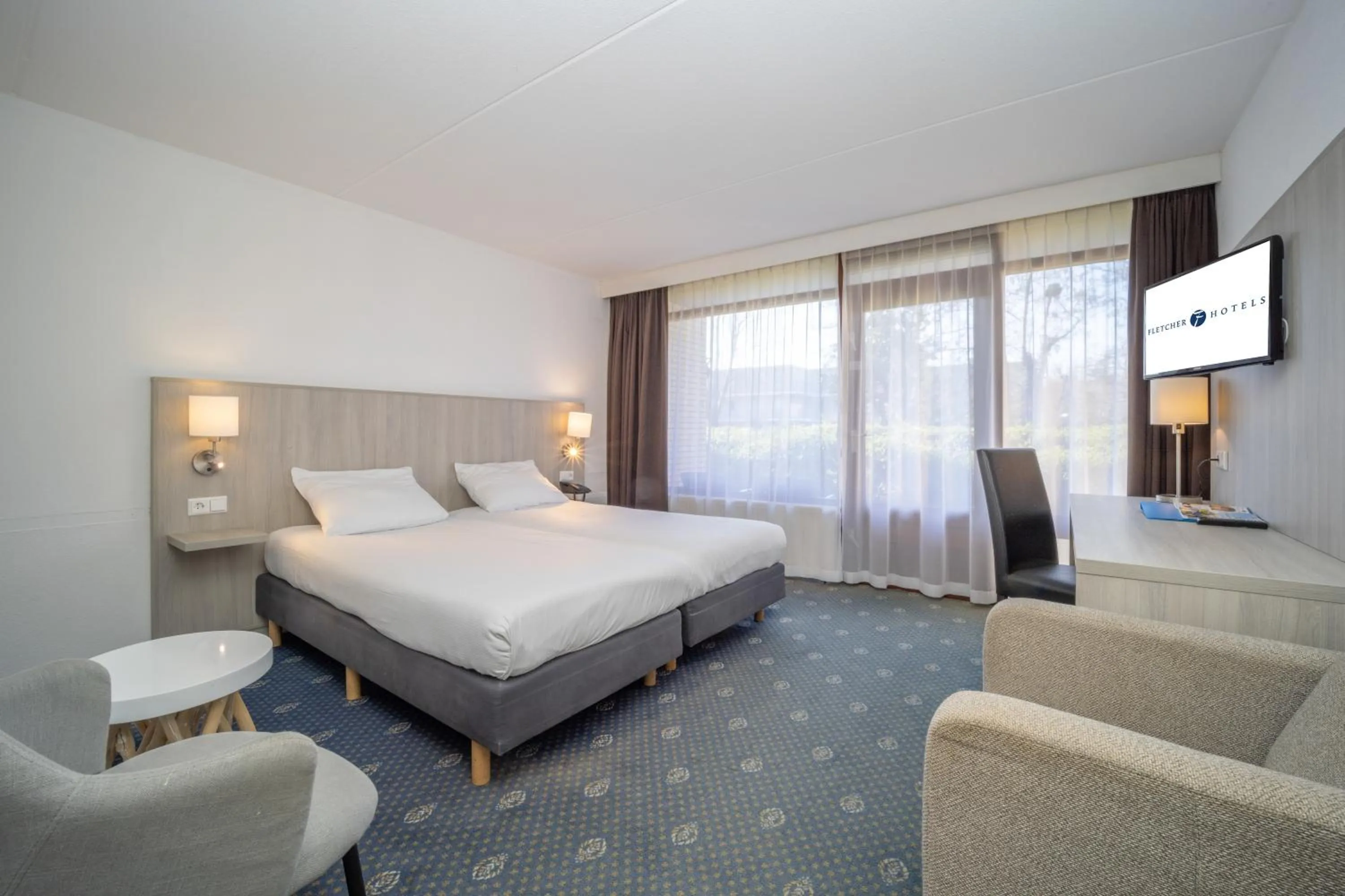 Bedroom in Fletcher Hotel - Restaurant Heiloo