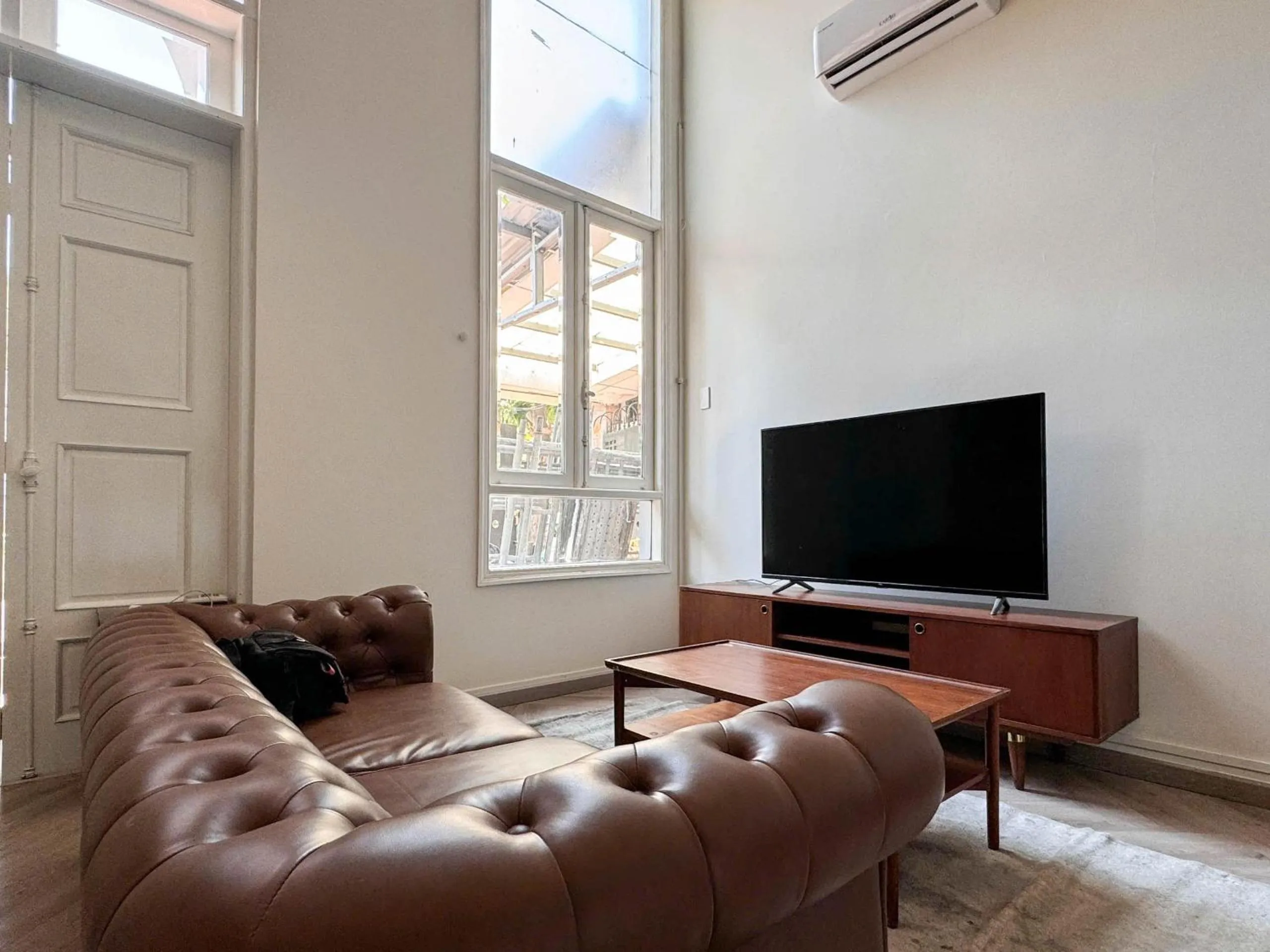 TV and multimedia in Zeus Living - Room in Villas An Phu