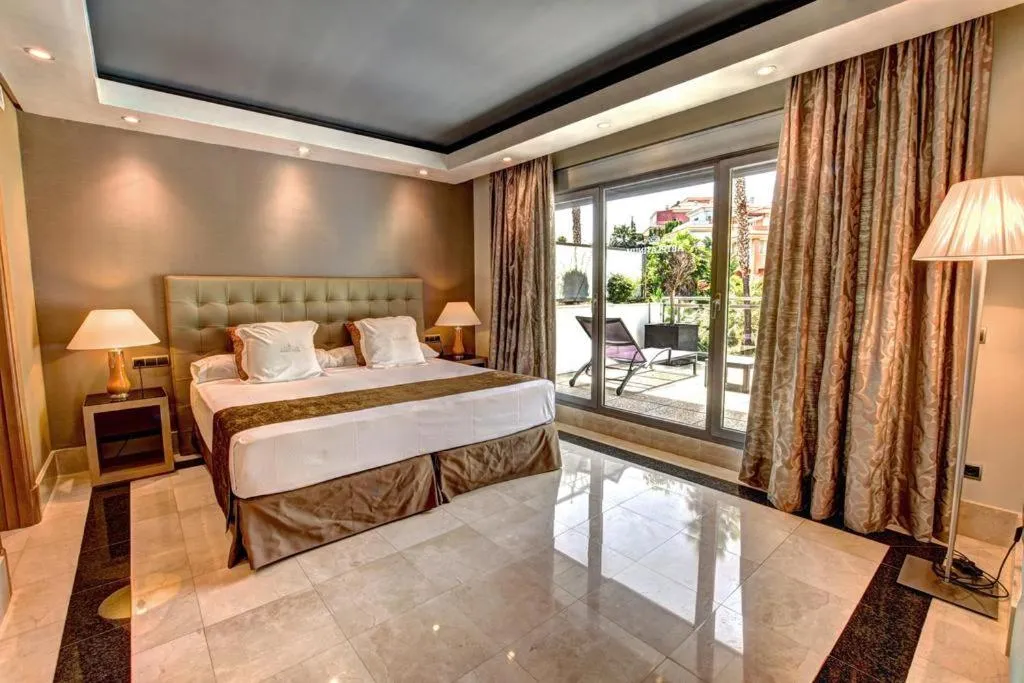 Bed in ArtPlatinum SUITES&APARTMENTS