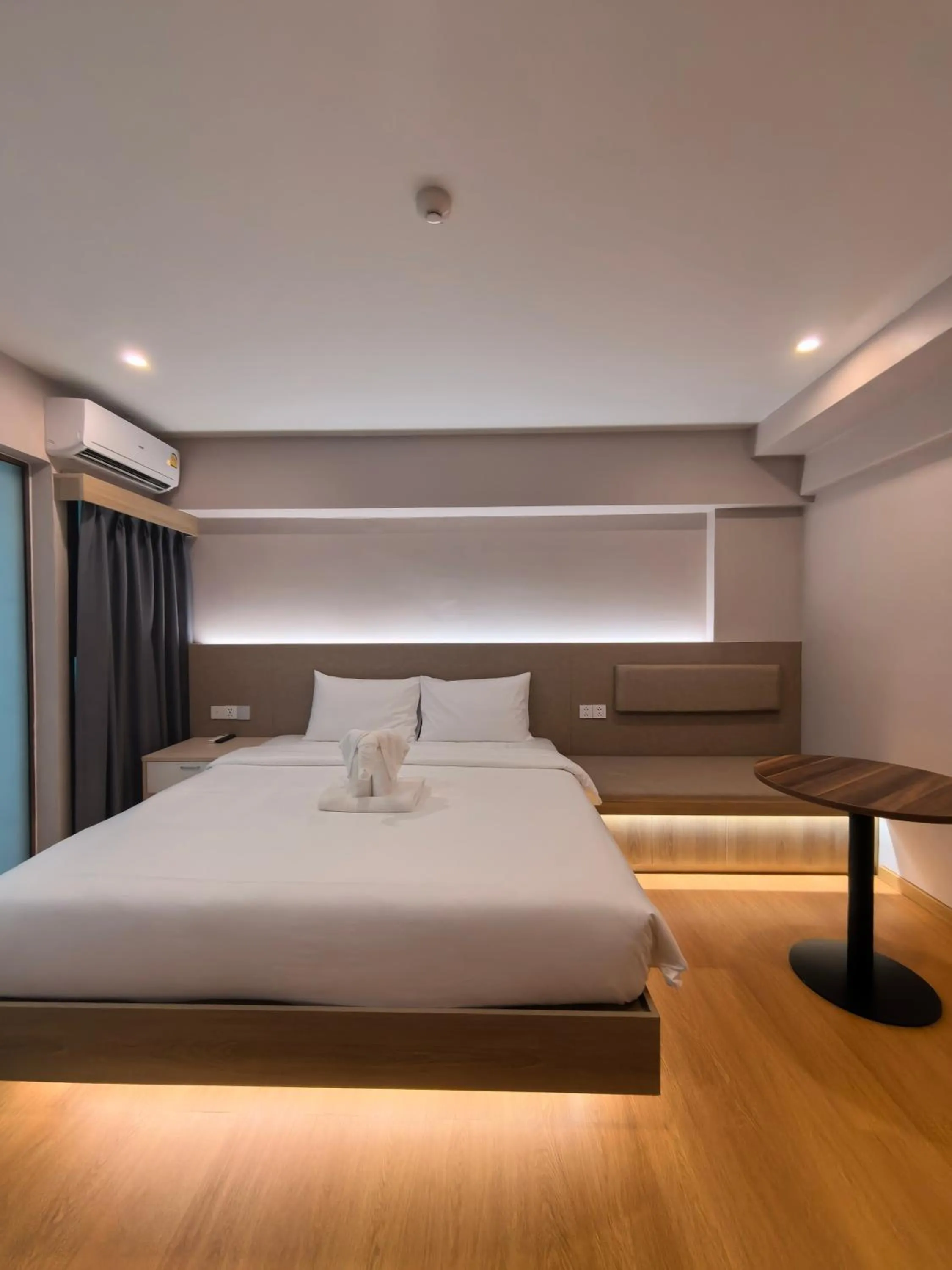 Bed in Lucky Elephant Hotel