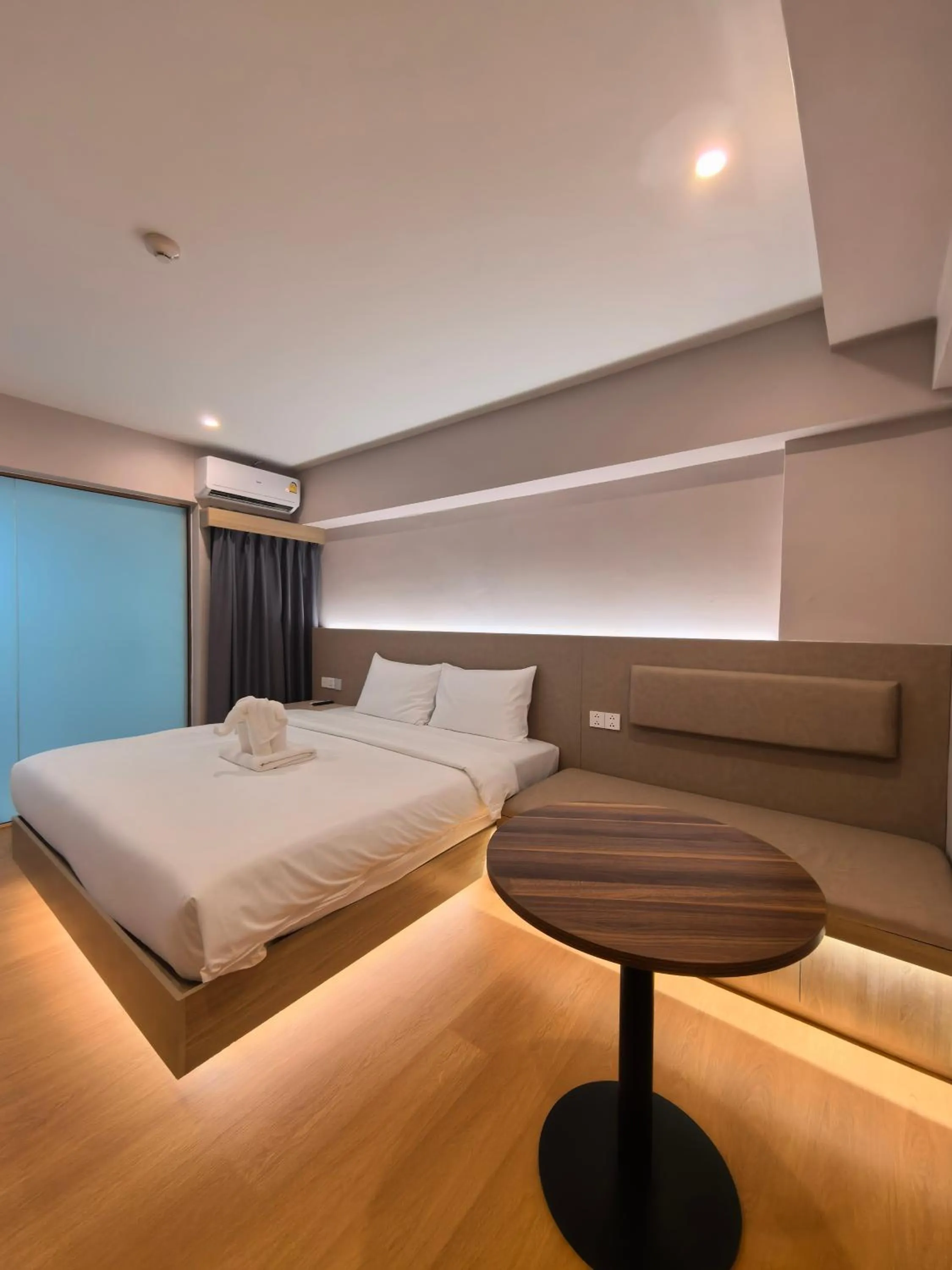 Bed in Lucky Elephant Hotel