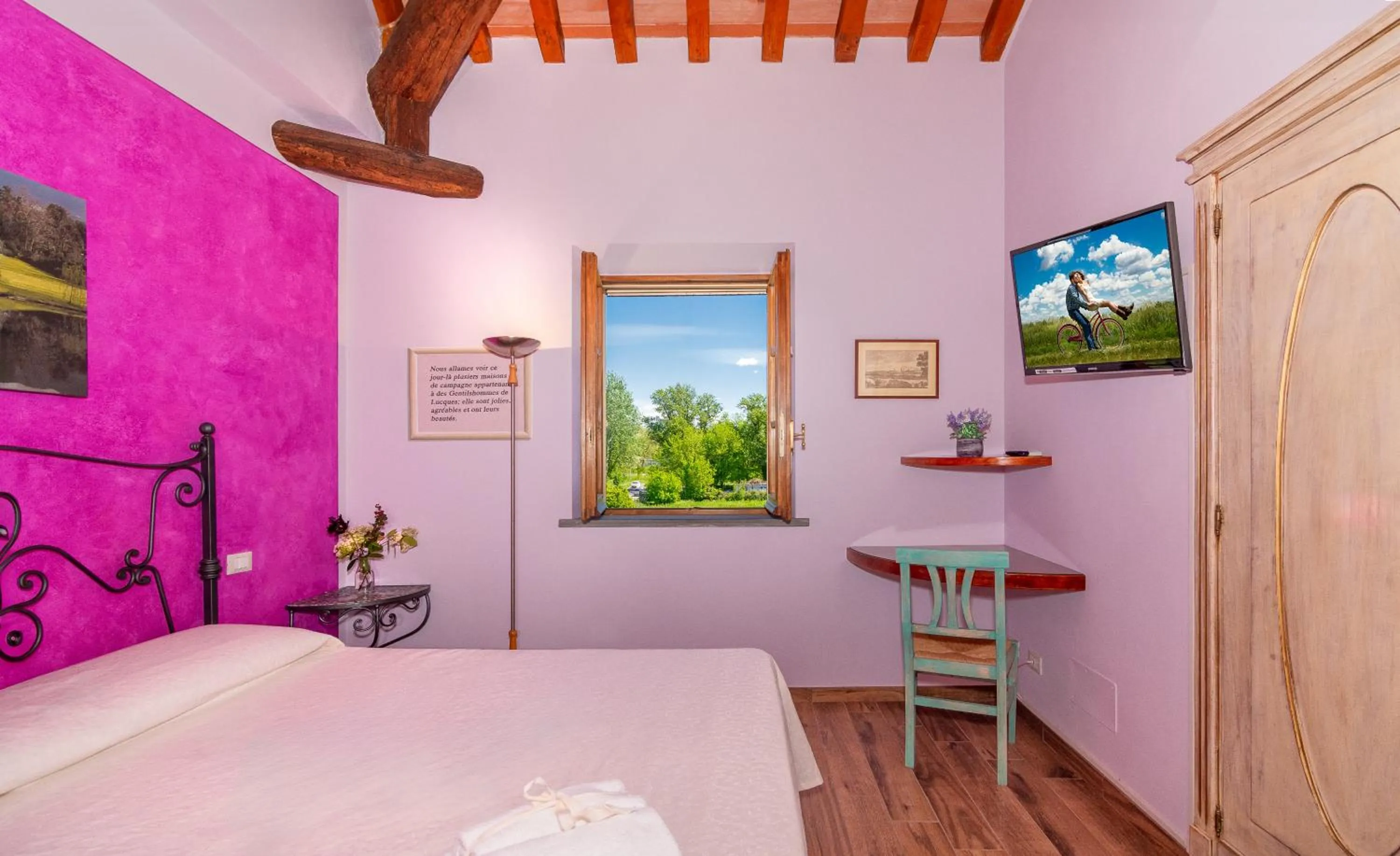 Bed in B&B Il Giardino dei Poeti and Apartaments